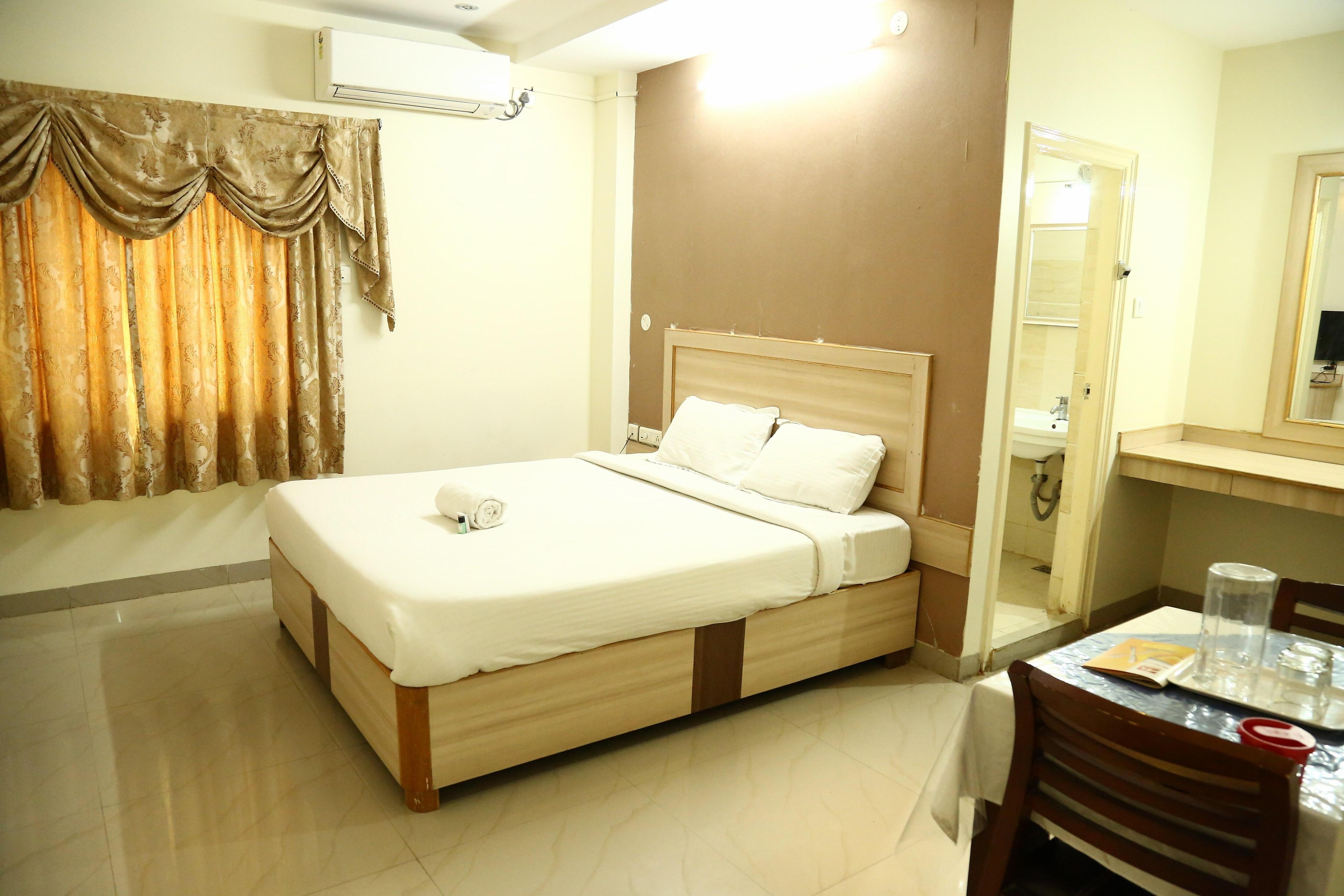 Manasa Inn - Tap to explore photos