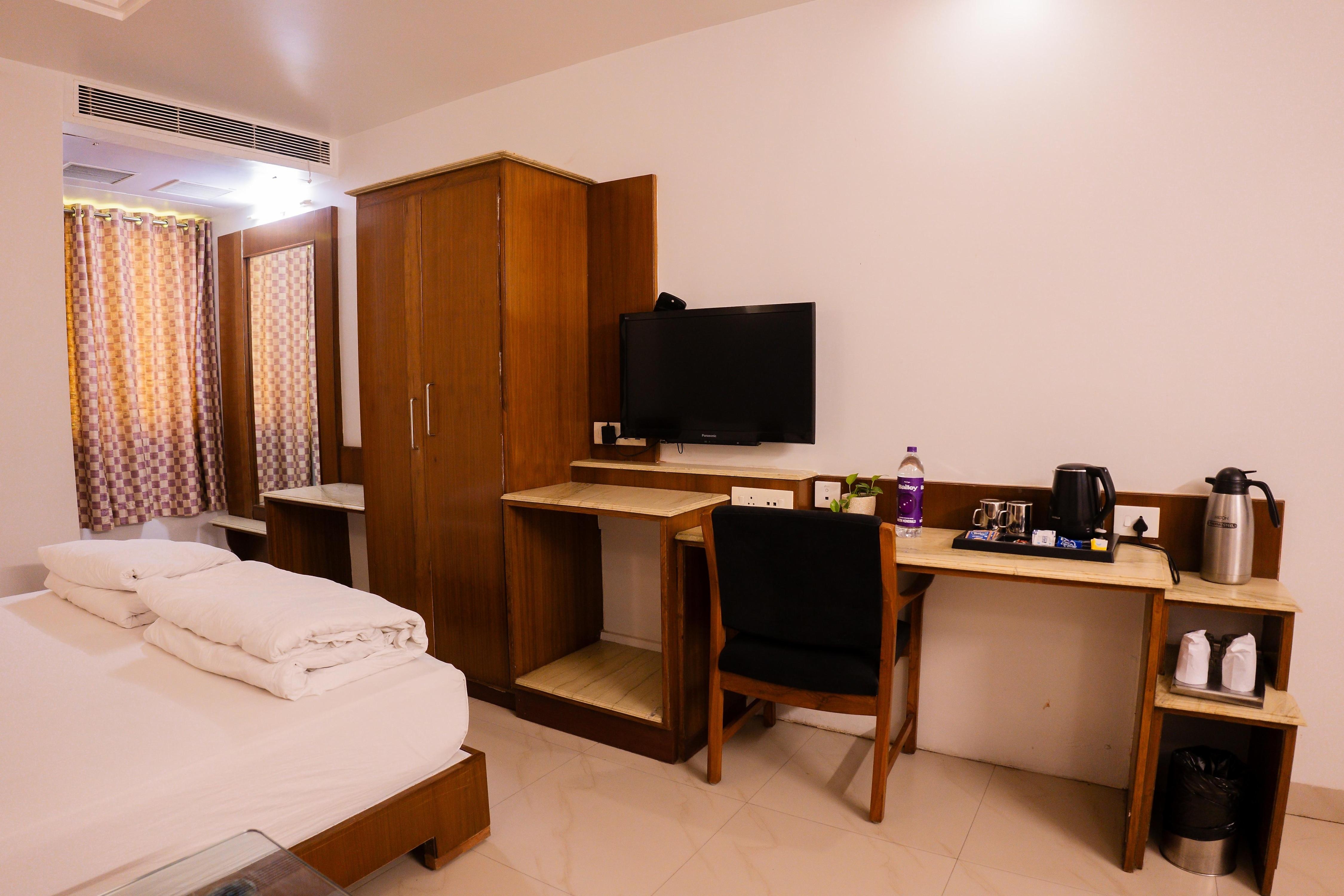 Jain's Hotel Rajhans - Tap to explore photos