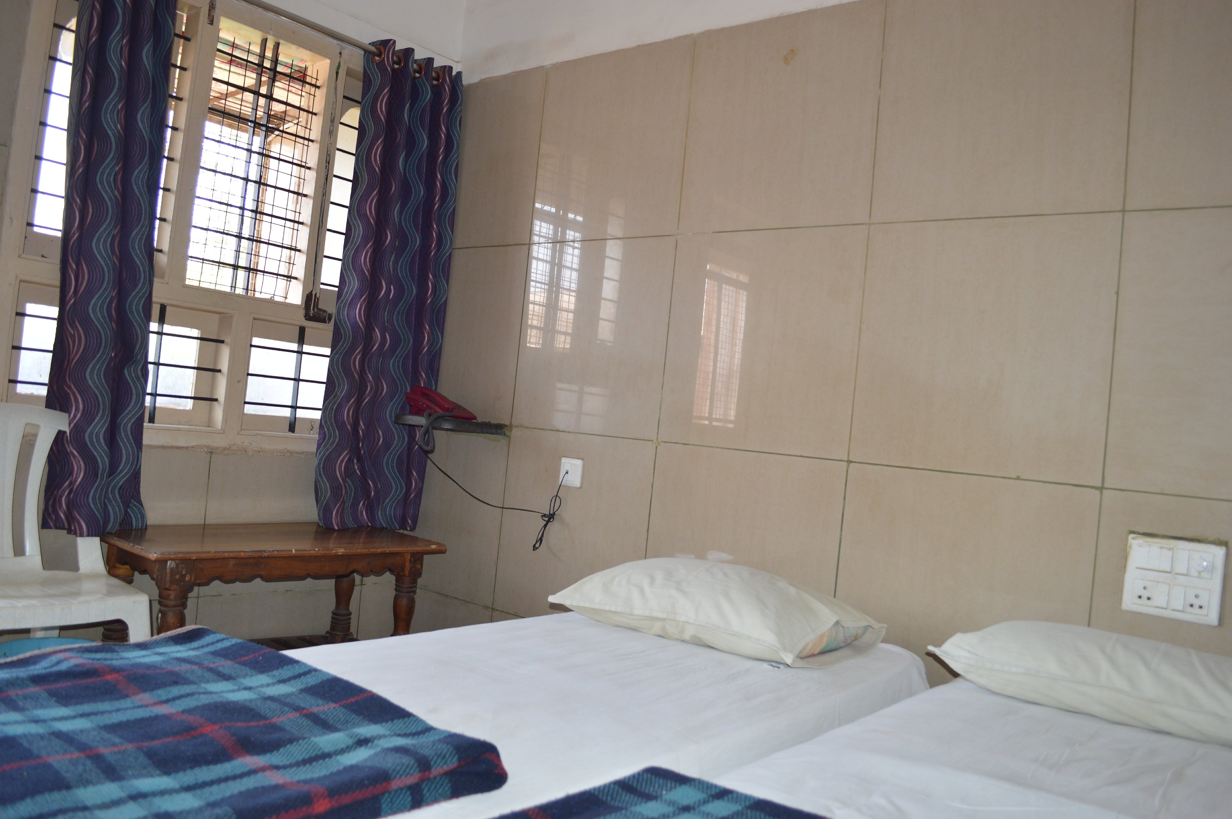 Mourya Deluxe A/C Lodge - Tap to explore photos