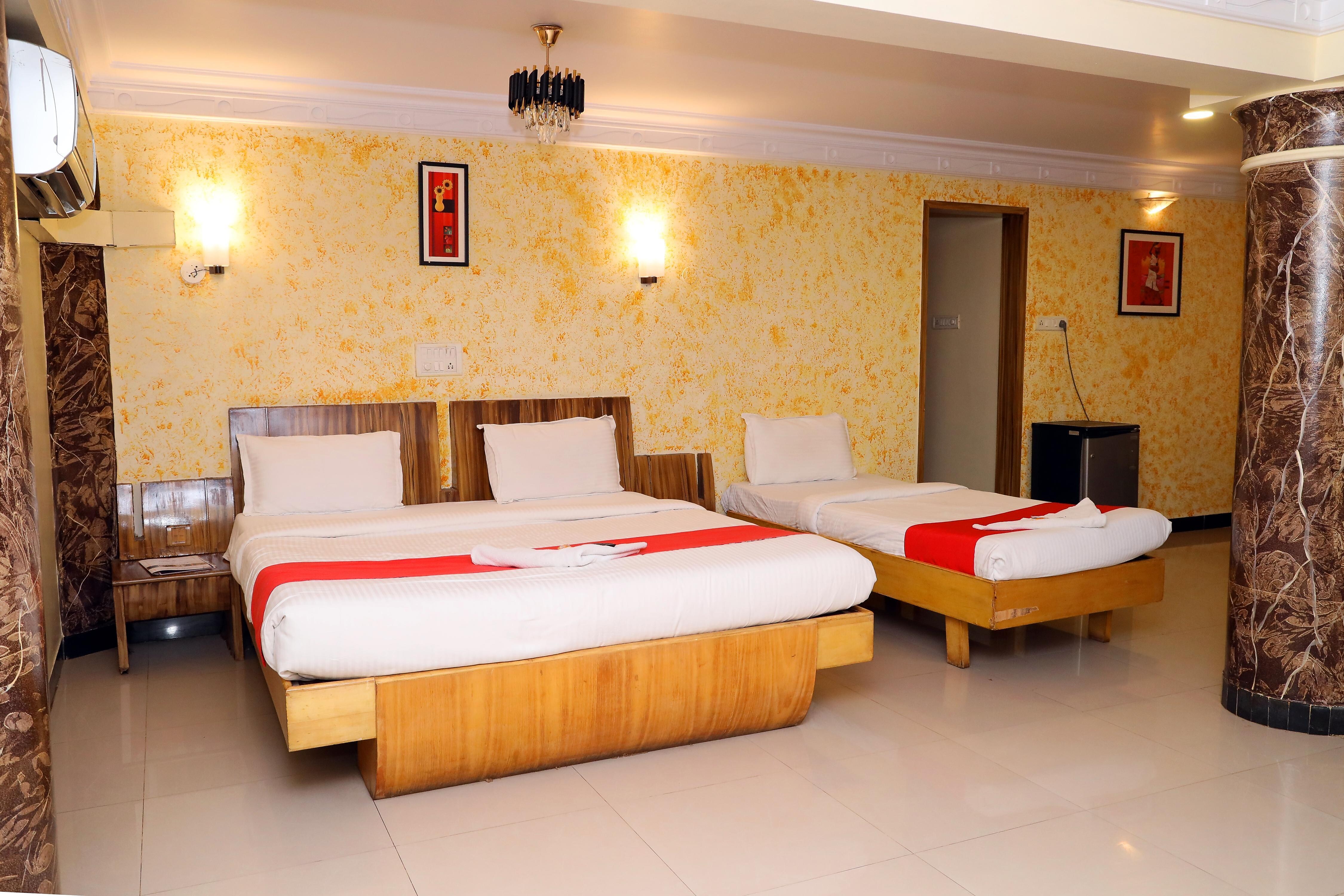Hotel Dhammanagi Comforts - Tap to explore photos