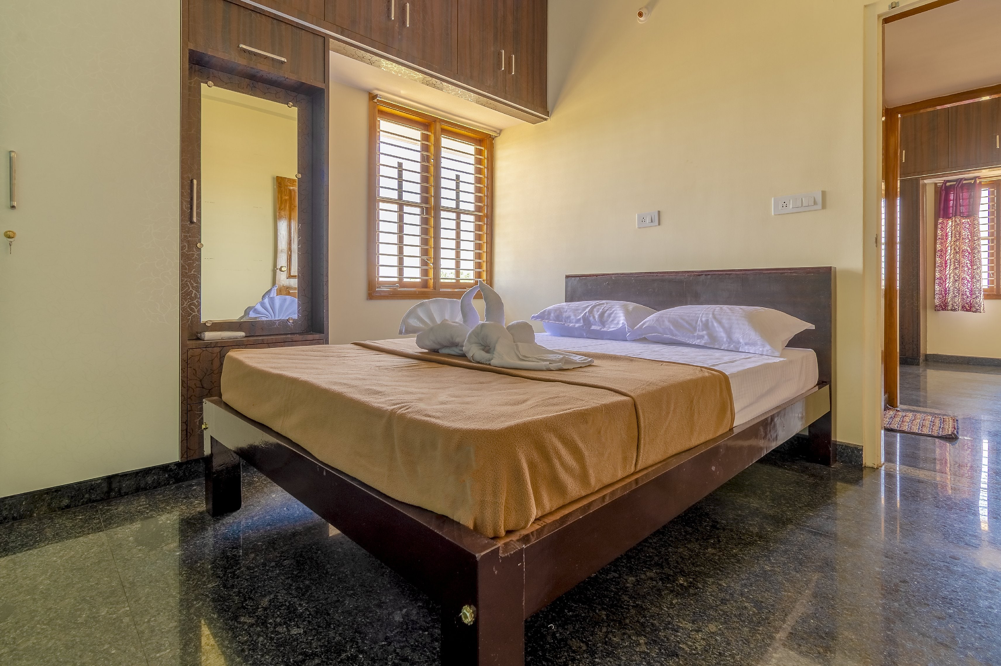 Unnathi Comfort Inn - Tap to explore photos