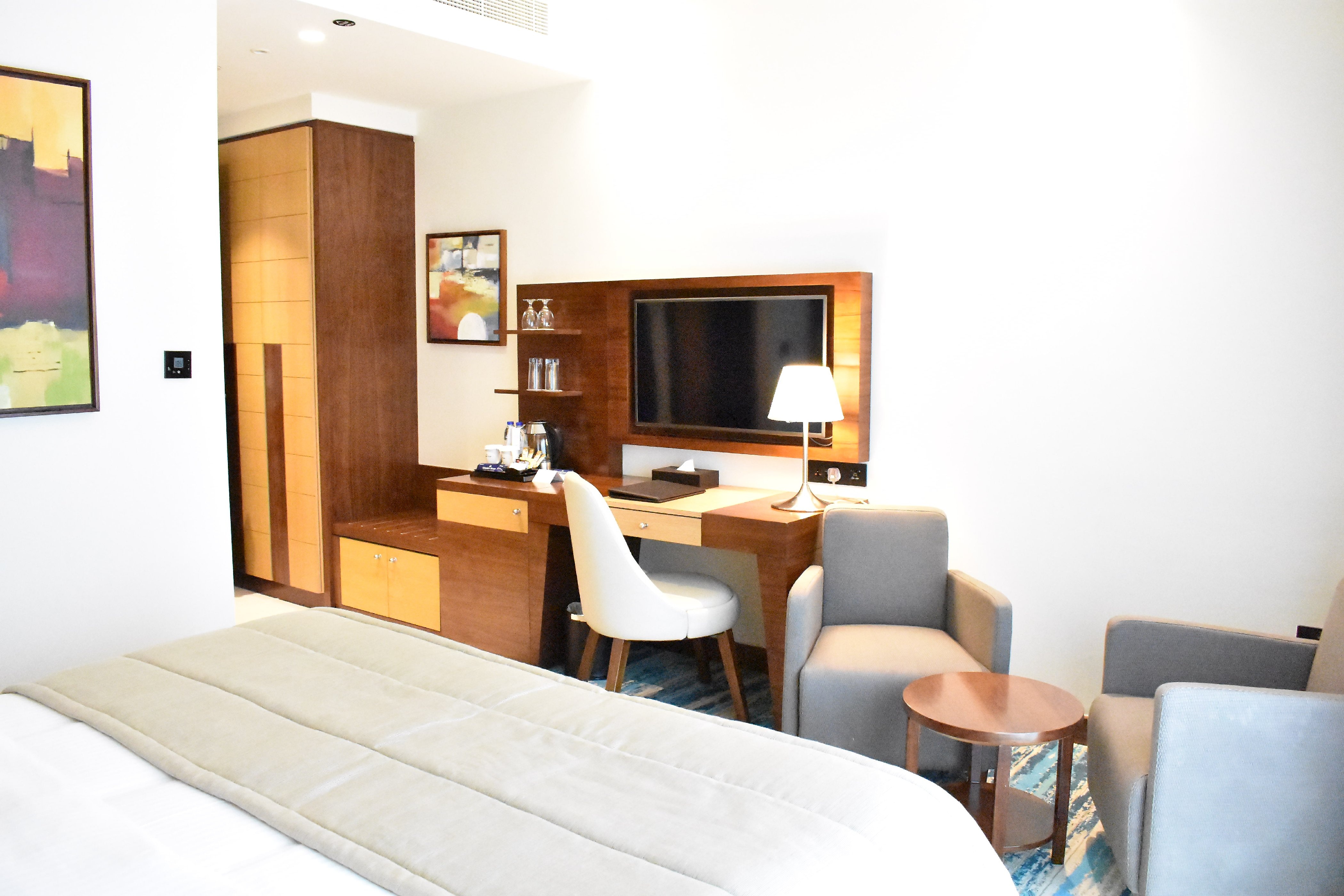 Golden Tulip Media Hotel - Tap to explore photos