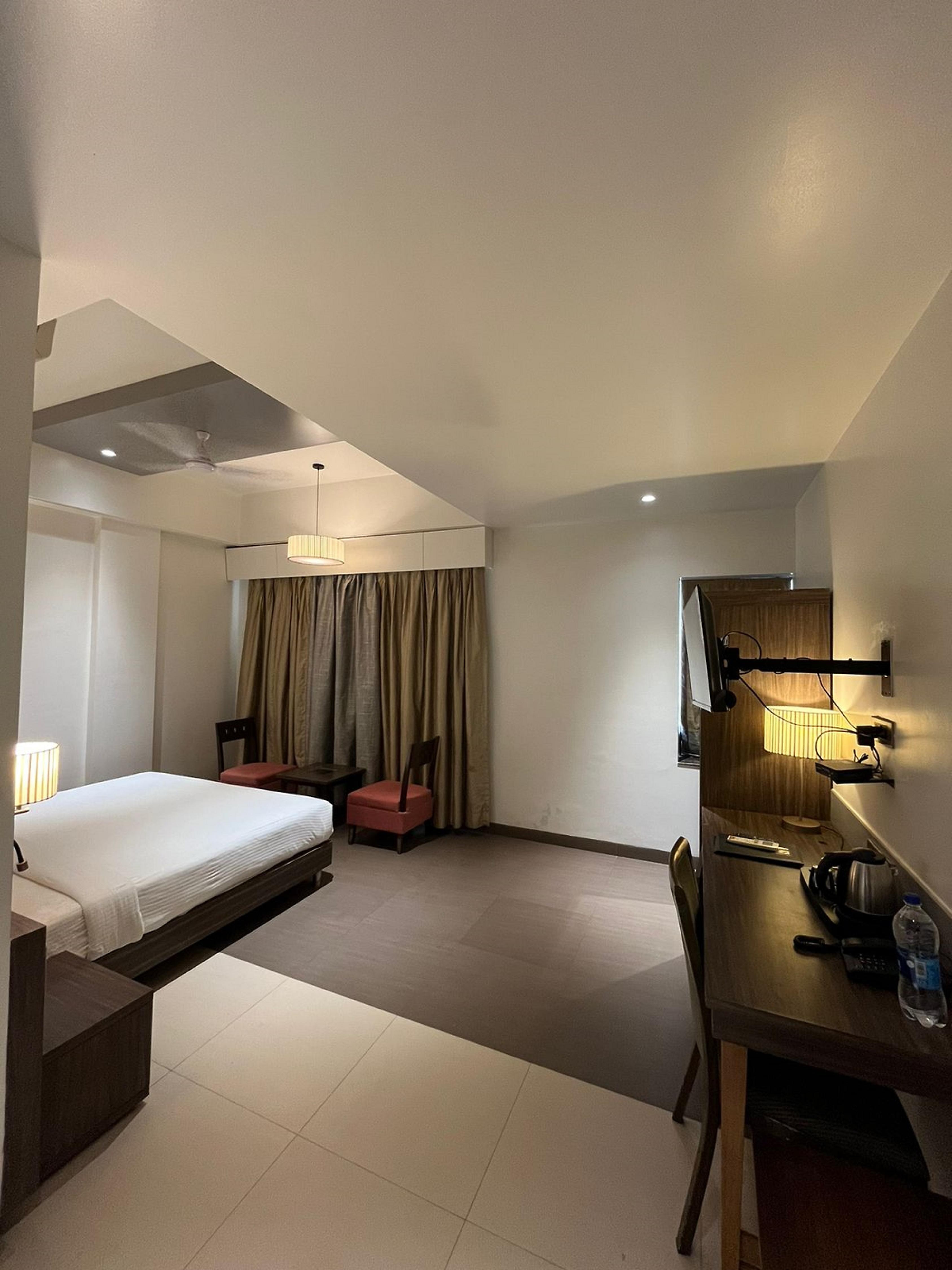 Hotel Sadanand Regency - Tap to explore photos