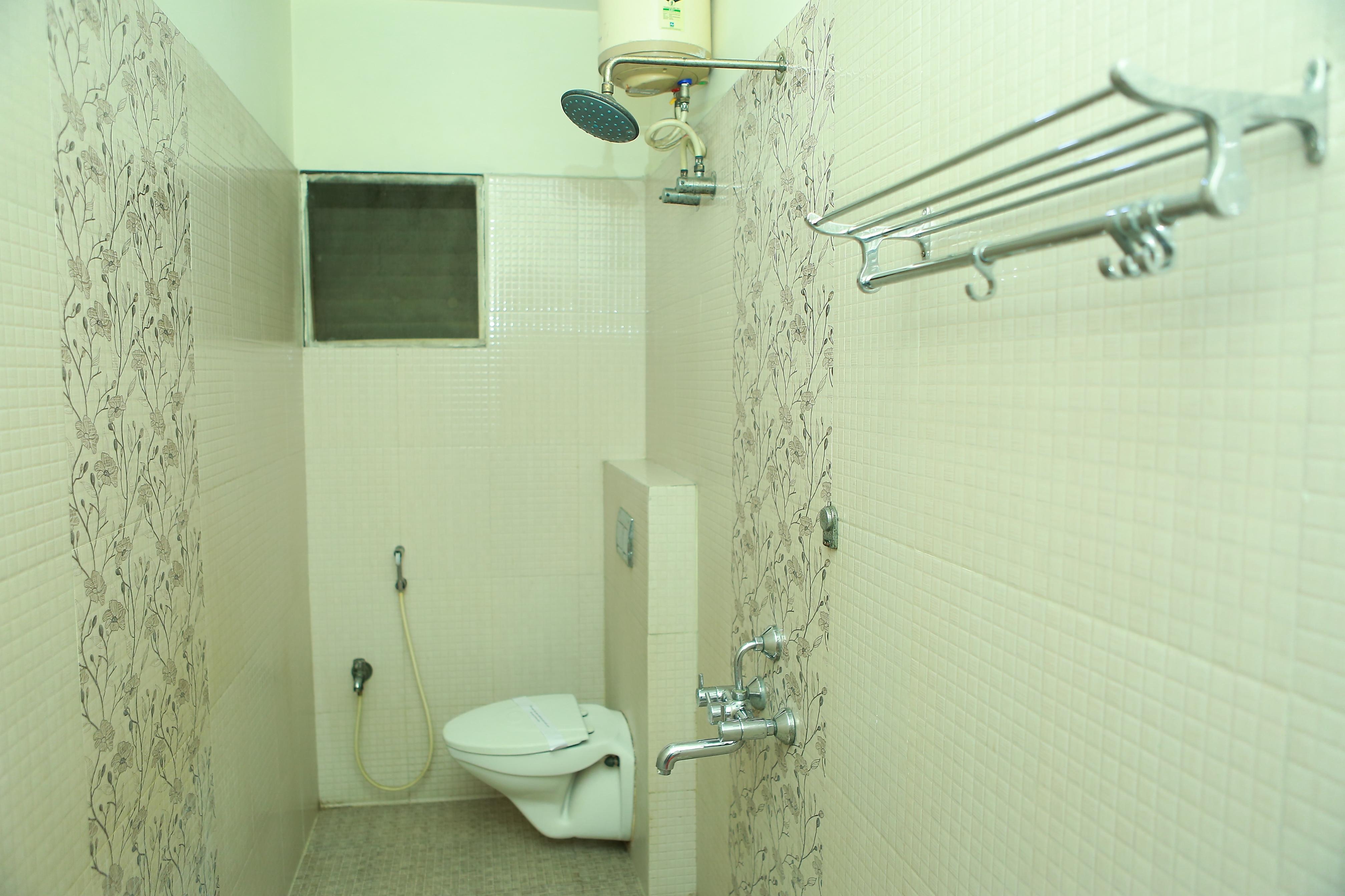 Hotel SR Guest House - Tap to explore photos
