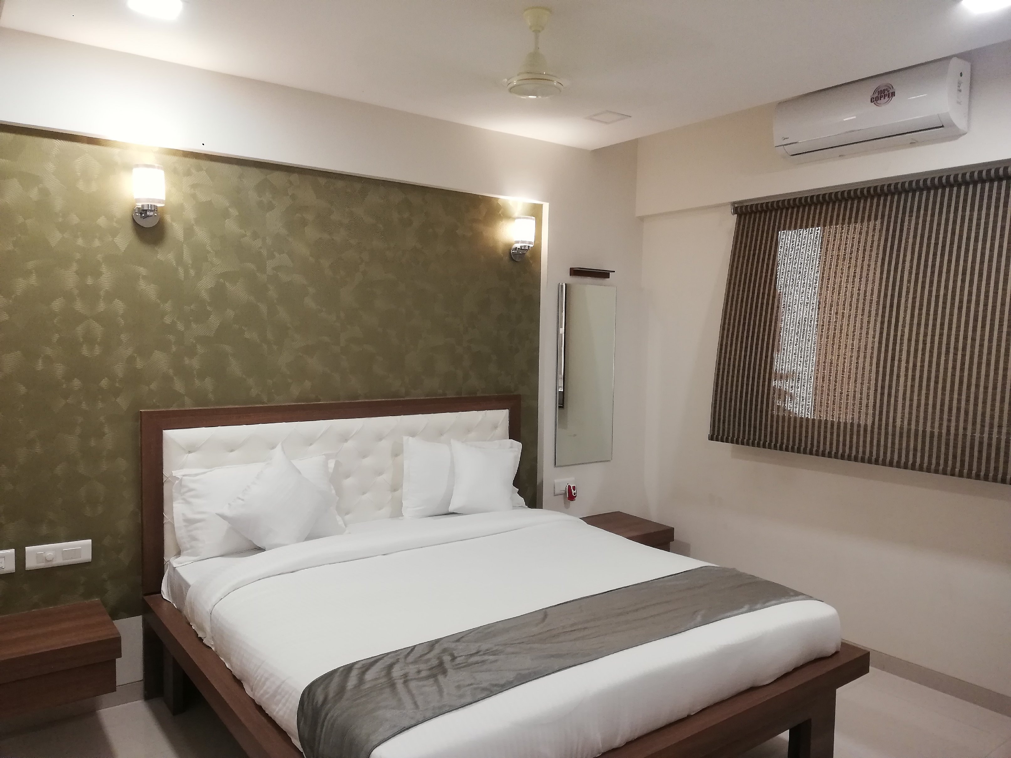 Hotel Vrushali Inn - Tap to explore photos
