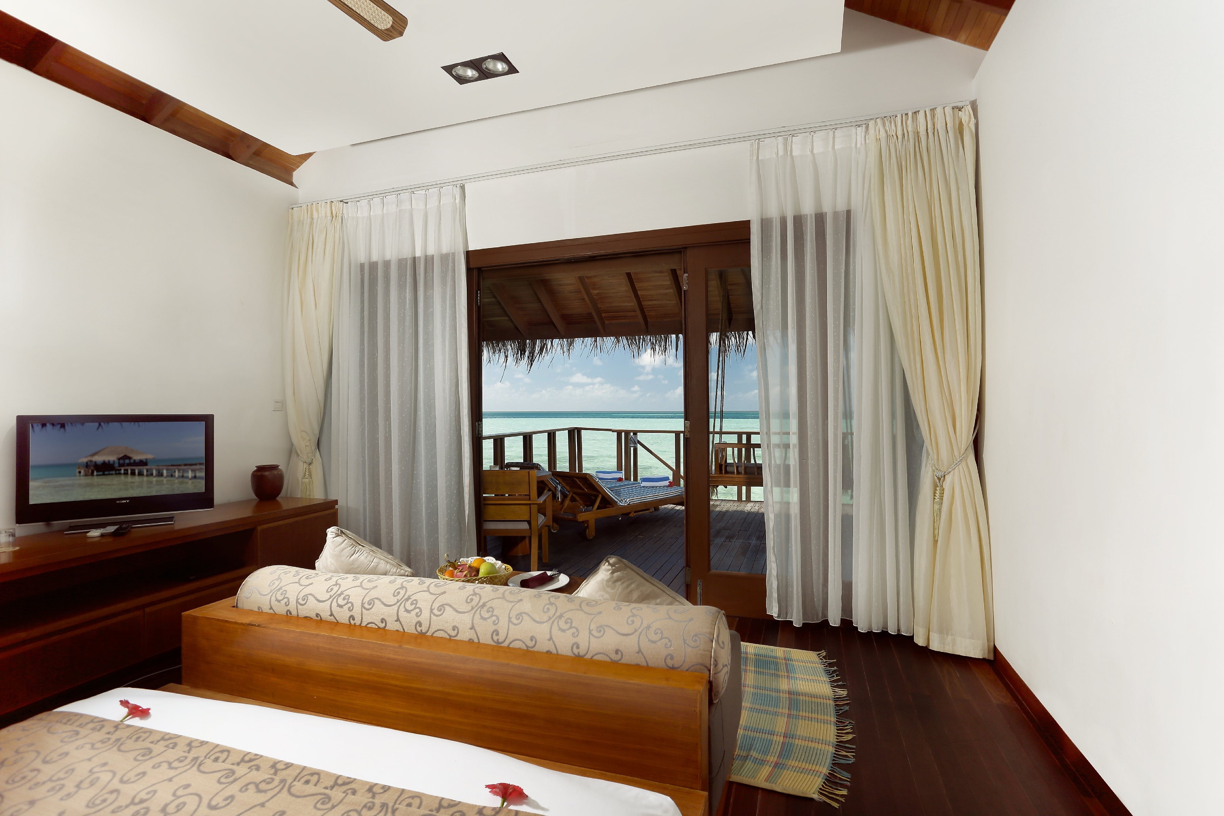 Medhufushi Island Resort Maldives - Tap to explore photos