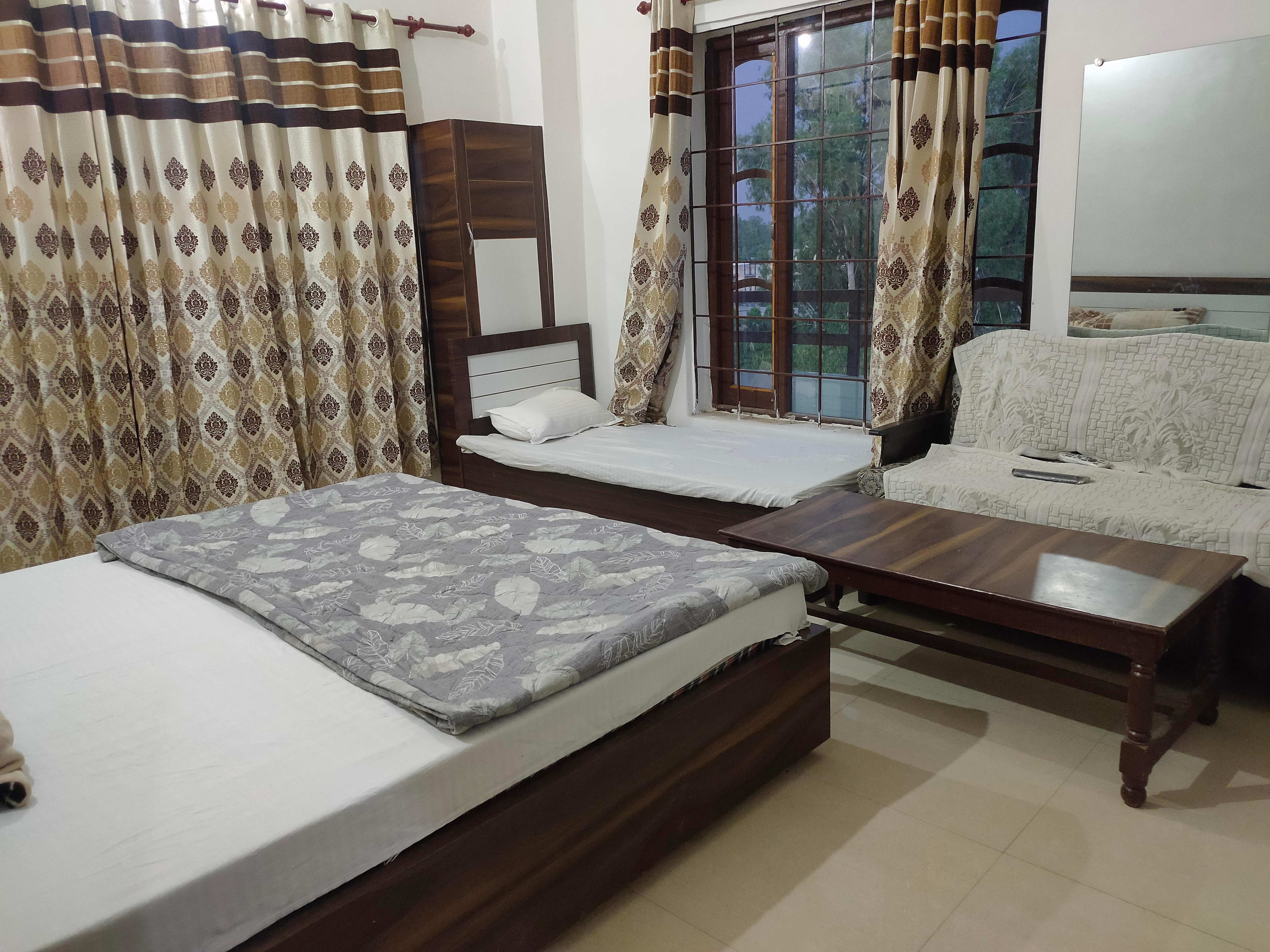 Arjun Guest House - Tap to explore photos