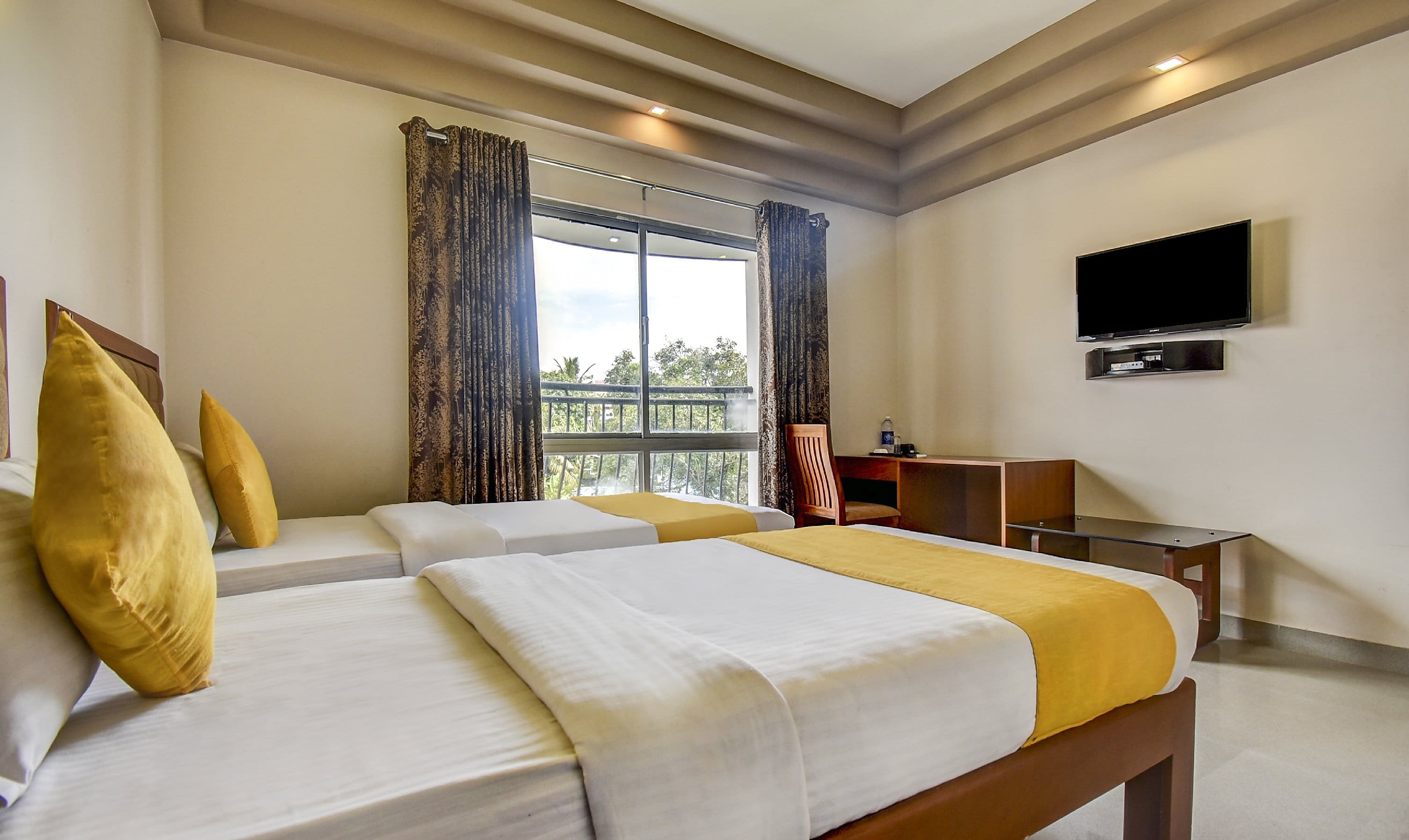 Garden Inn Business Hotel, Cochin - Tap to explore photos