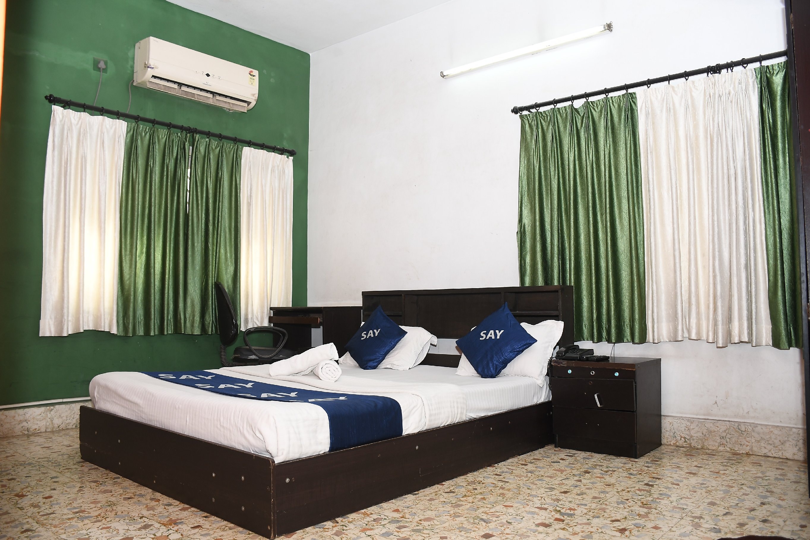 Say Rooms Trip Manager Guest House - Tap to explore photos