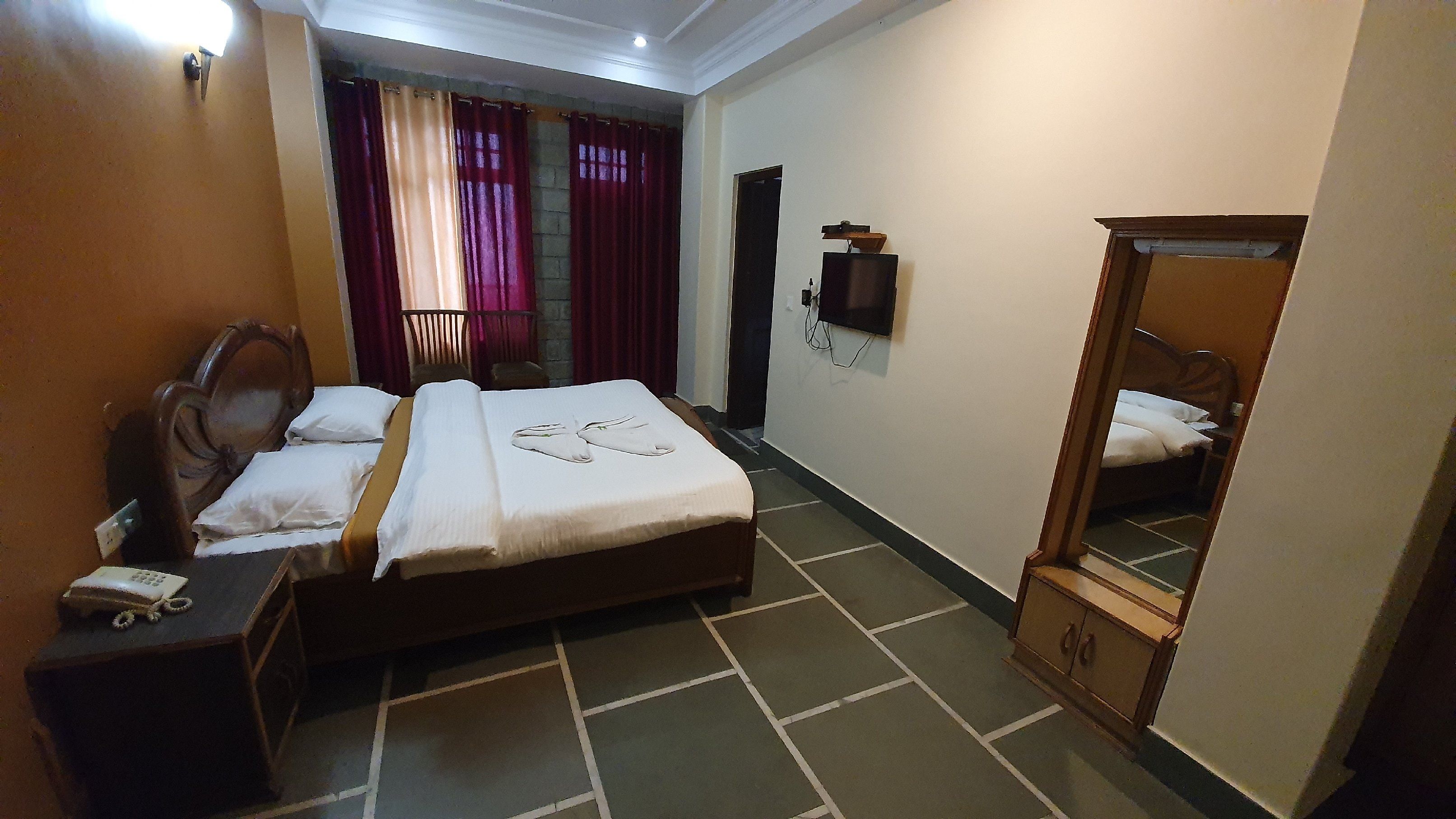 Ashoka International Guest House - Tap to explore photos