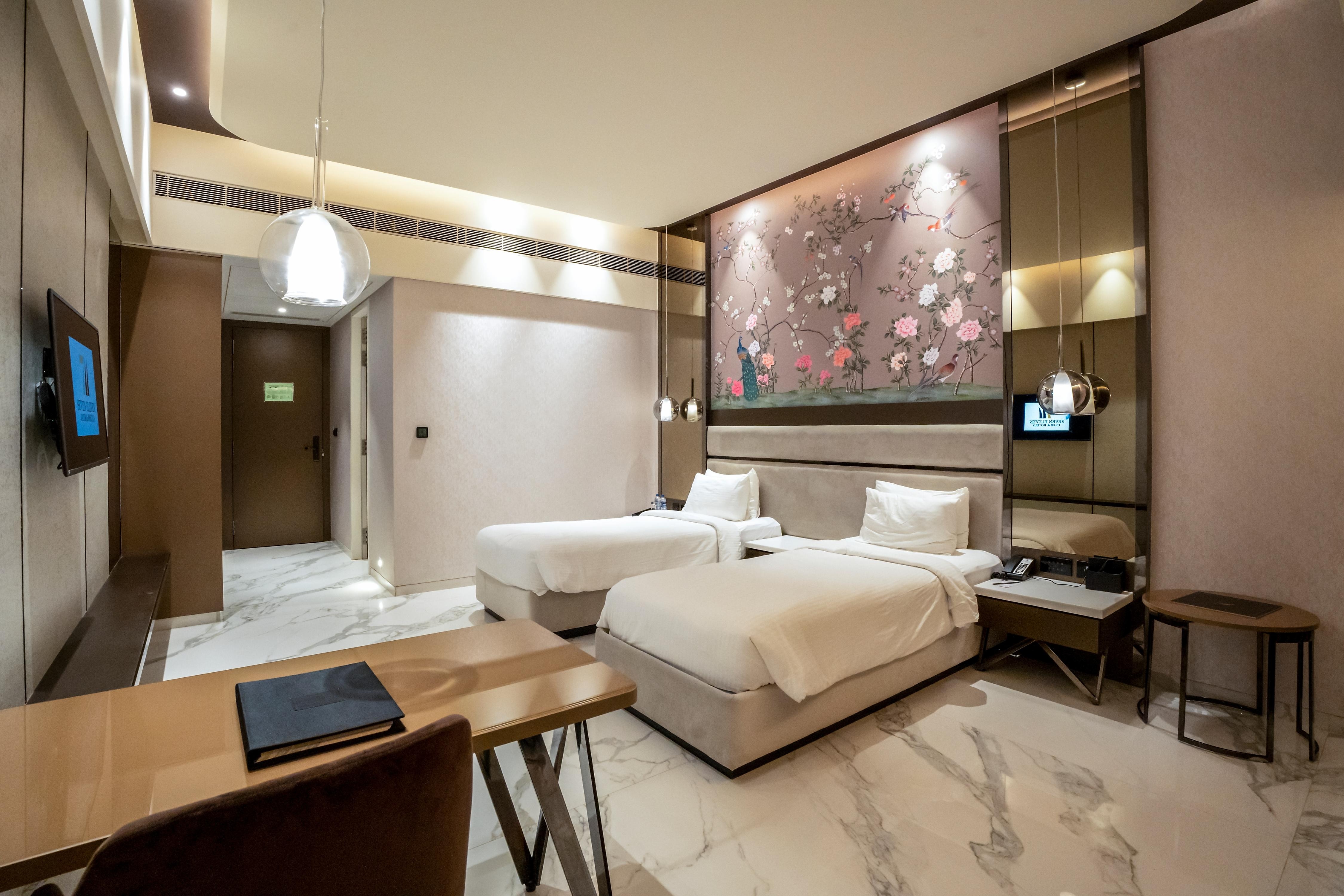 Seven ElevenHotels & Club - Tap to explore photos