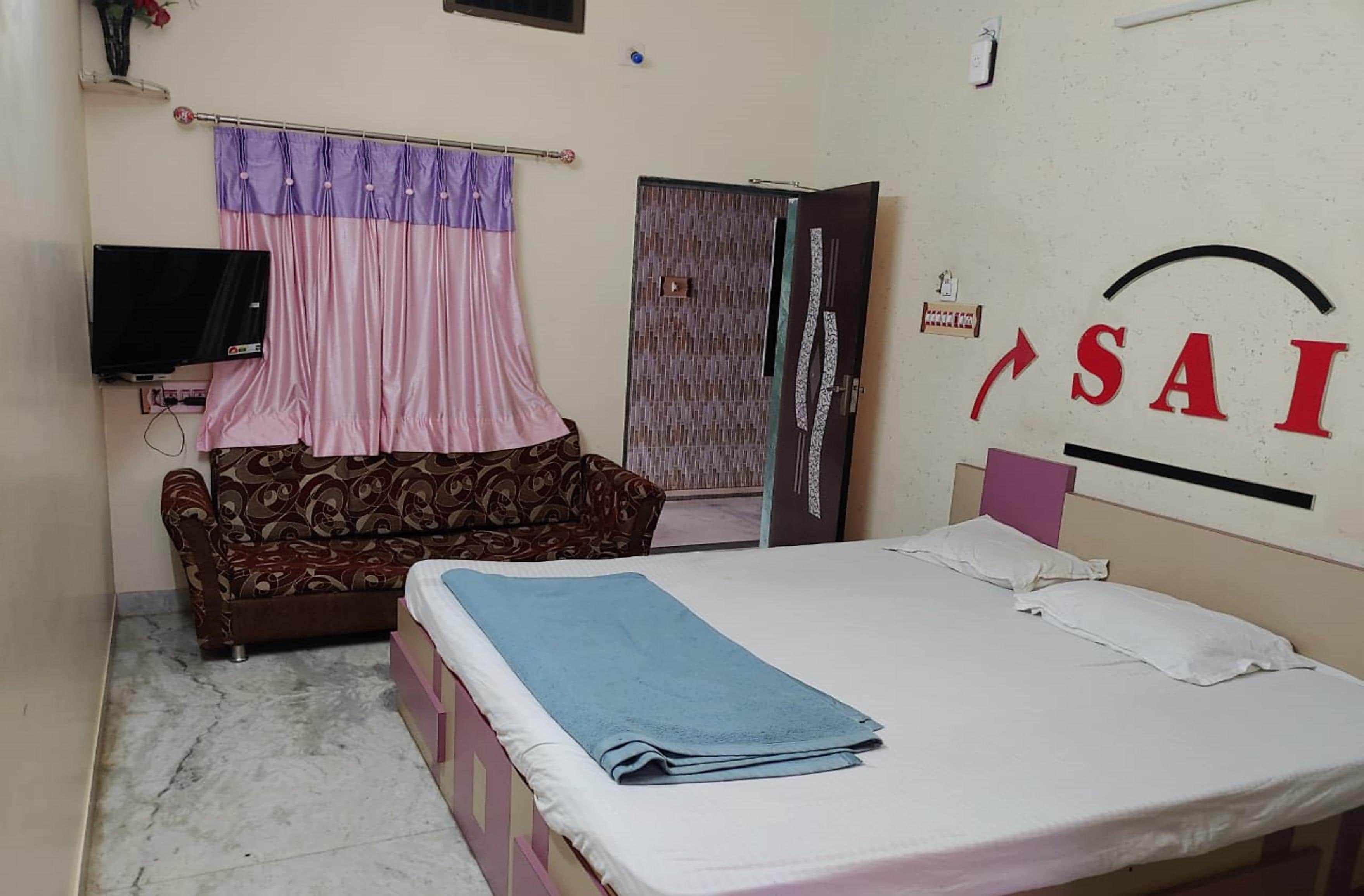 Shree Sai Guest House - Tap to explore photos