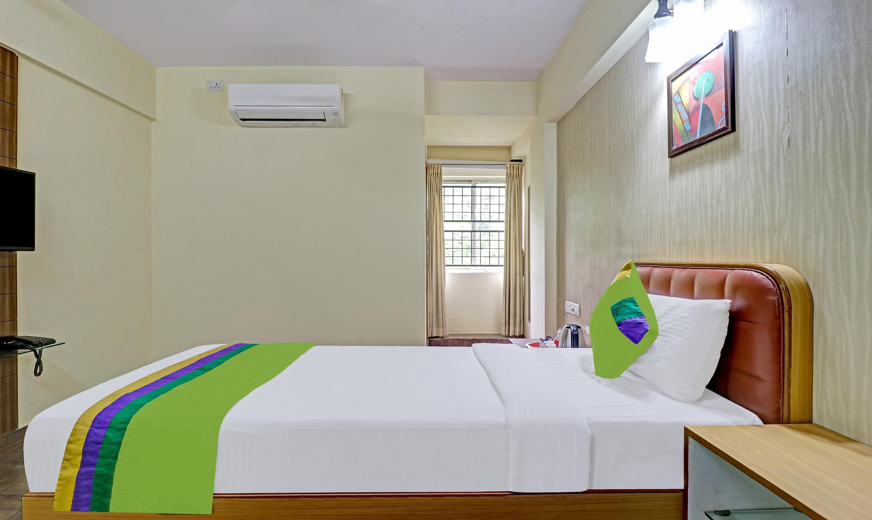 Treebo Akshaya Mayflower Vijaya Bank Layout - Tap to explore photos