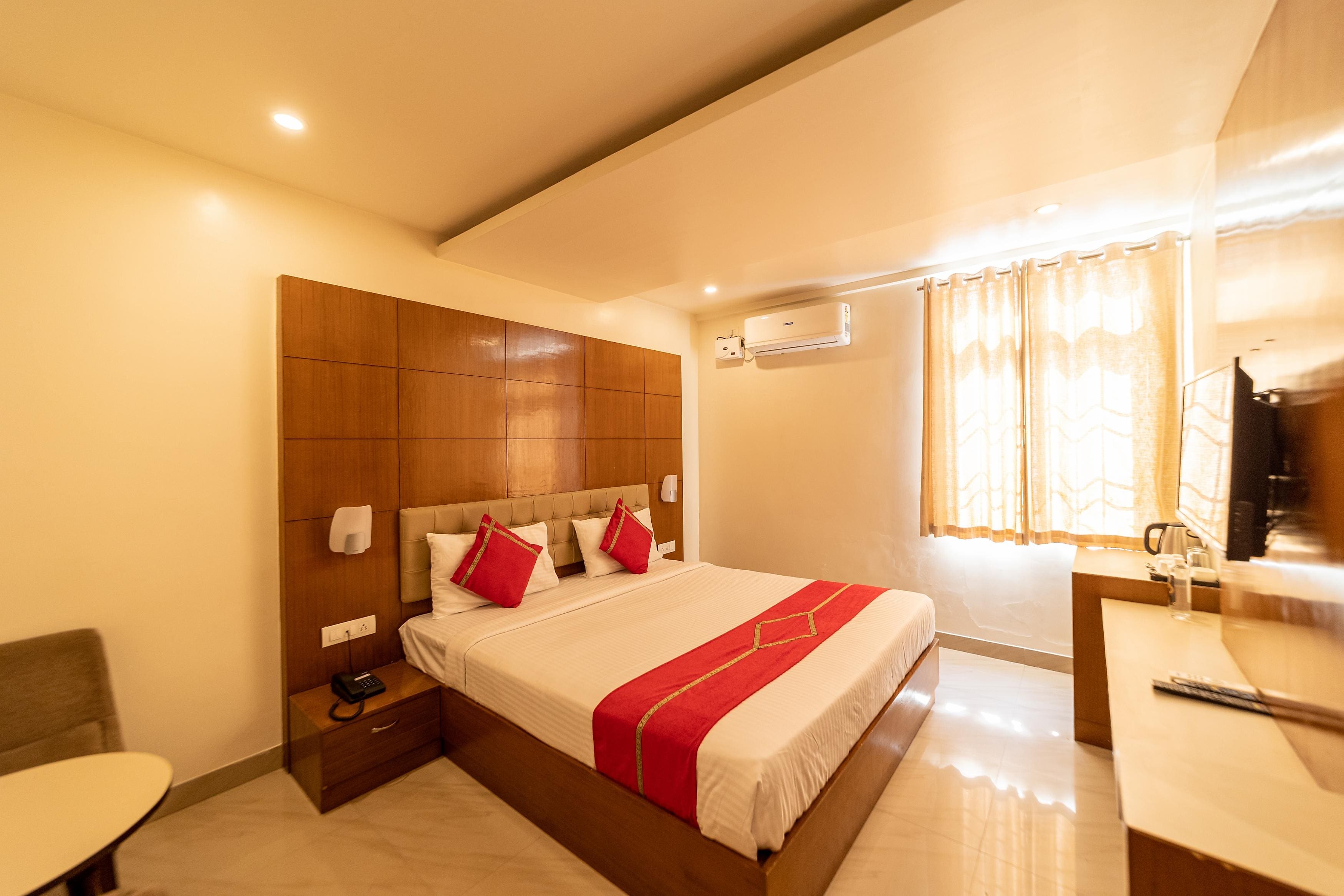 Tetrad Hotels - International Airport Road Hebbal - Tap to explore photos