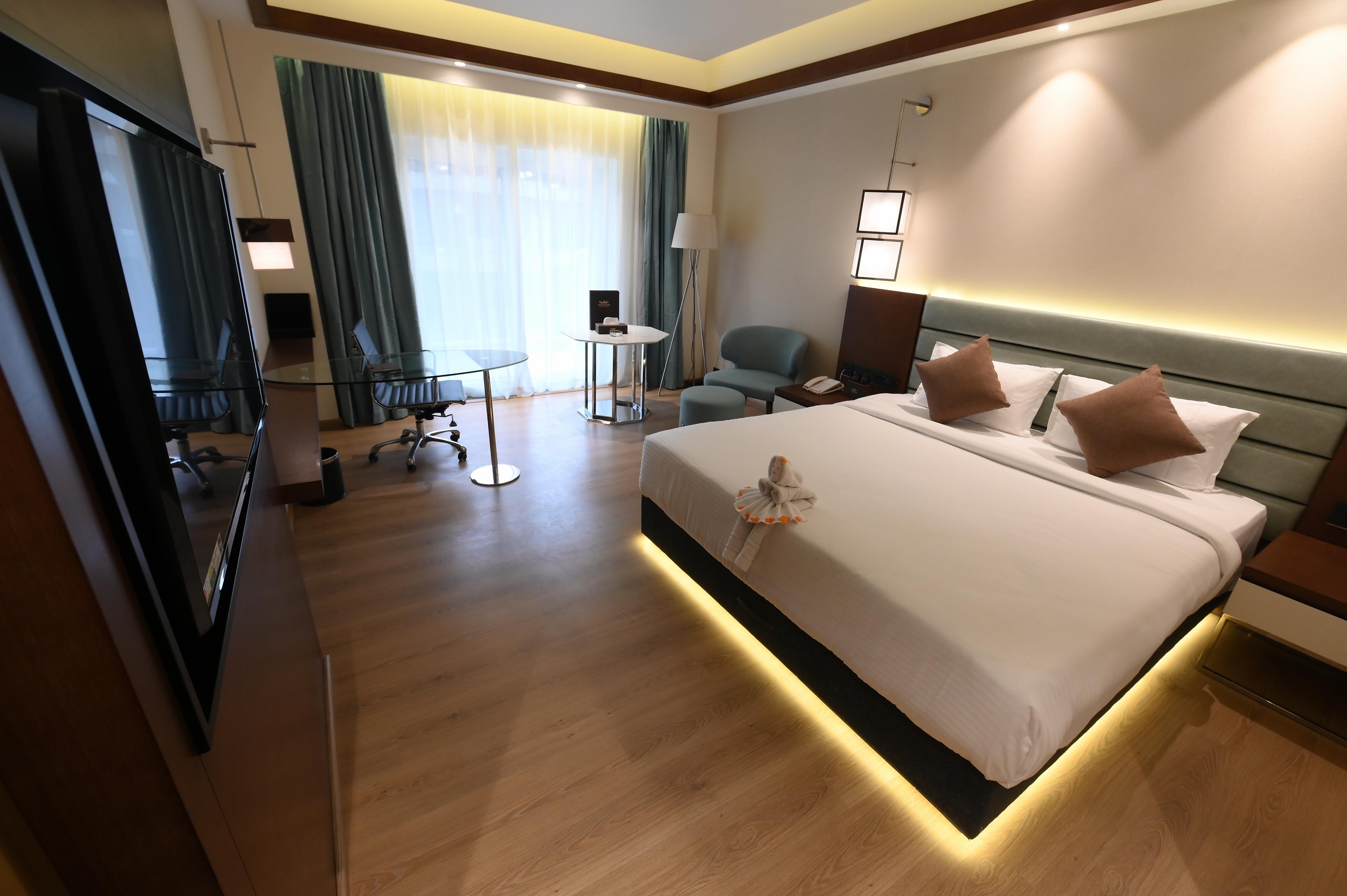 Hotel Avinash International - Tap to explore photos