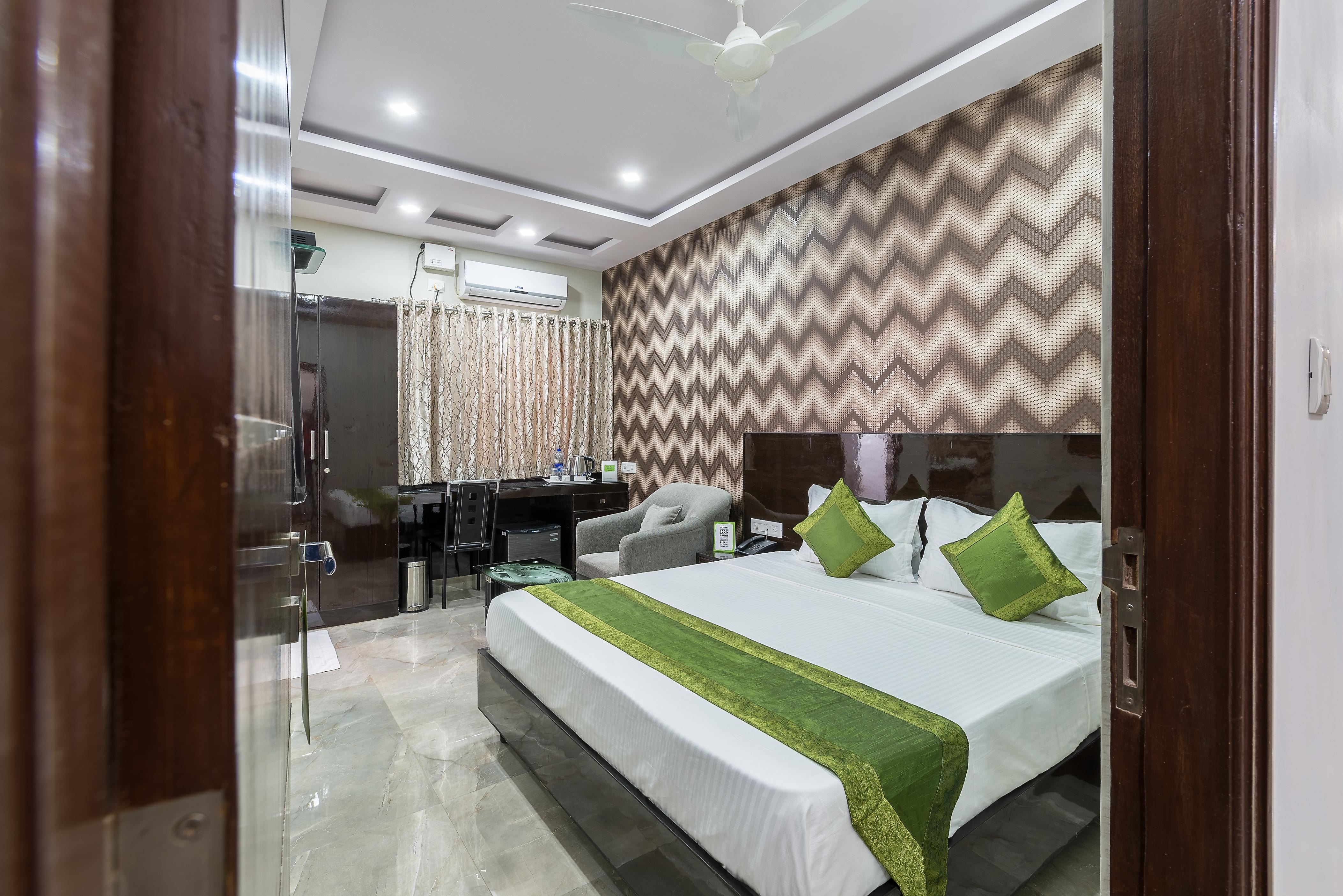 Treebo Greenwood Premier Suites, Old Airport Road - Tap to explore photos
