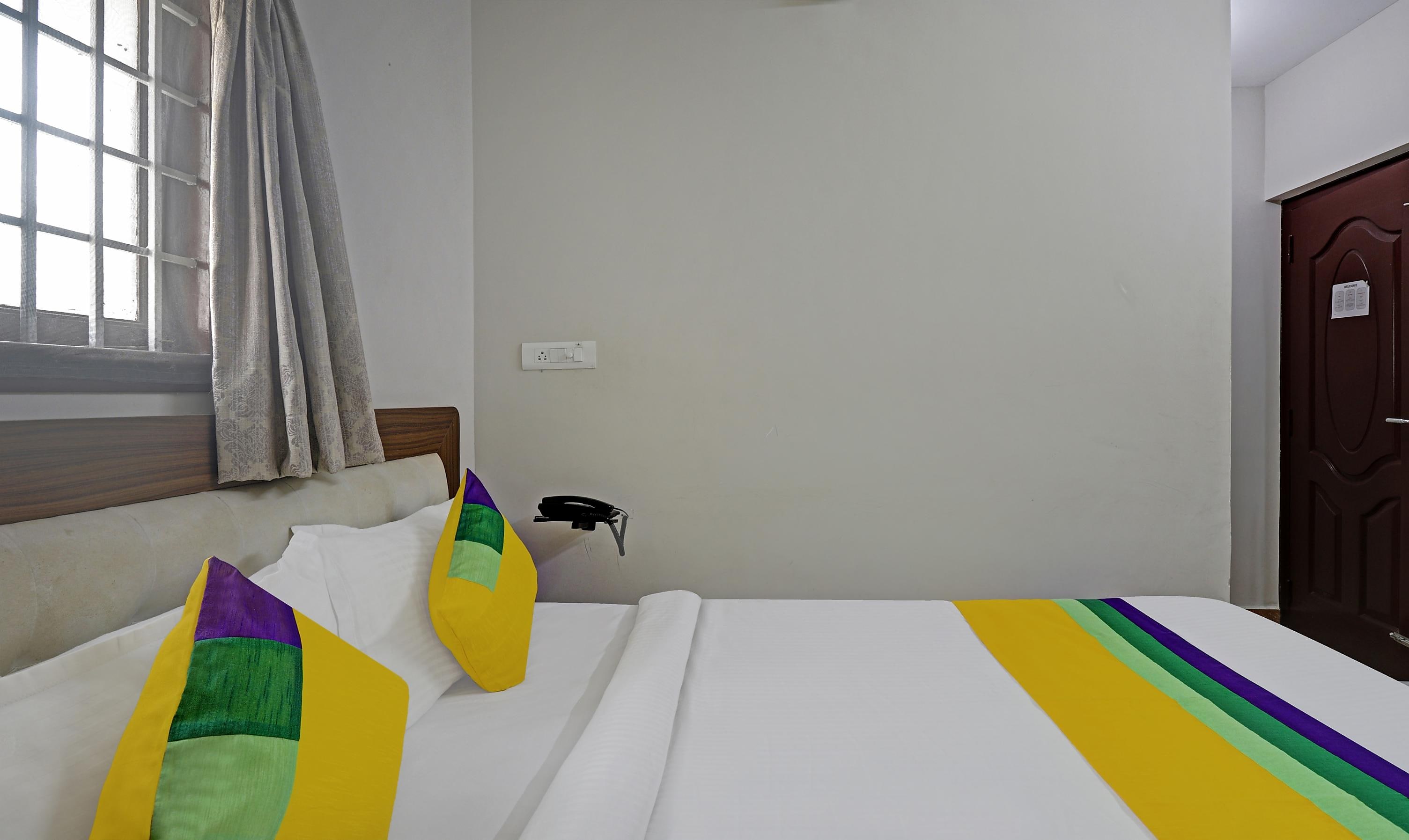 Itsy Hotels Rithika Inn Blossoms - Tap to explore photos