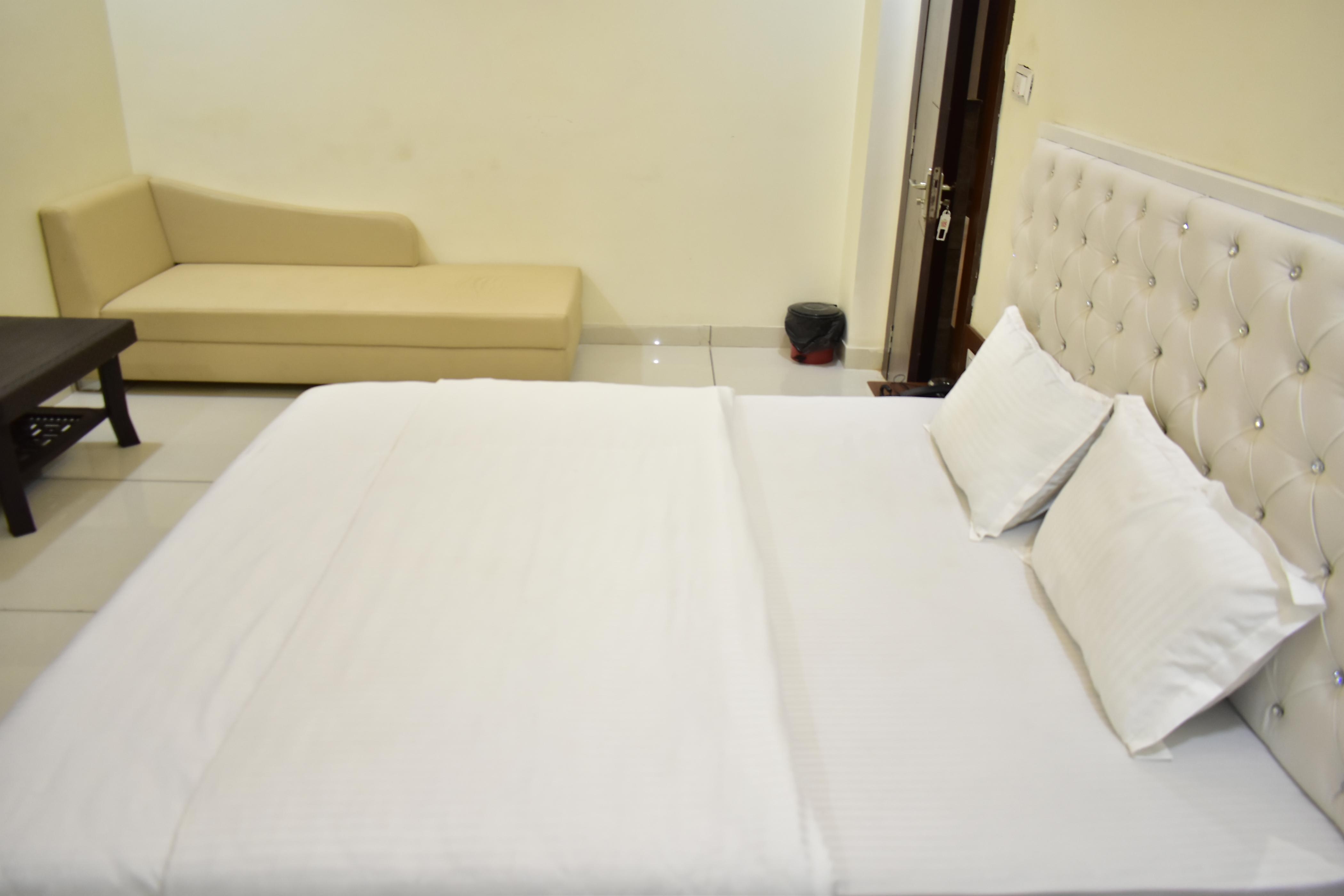 Hotel New shikha - Tap to explore photos