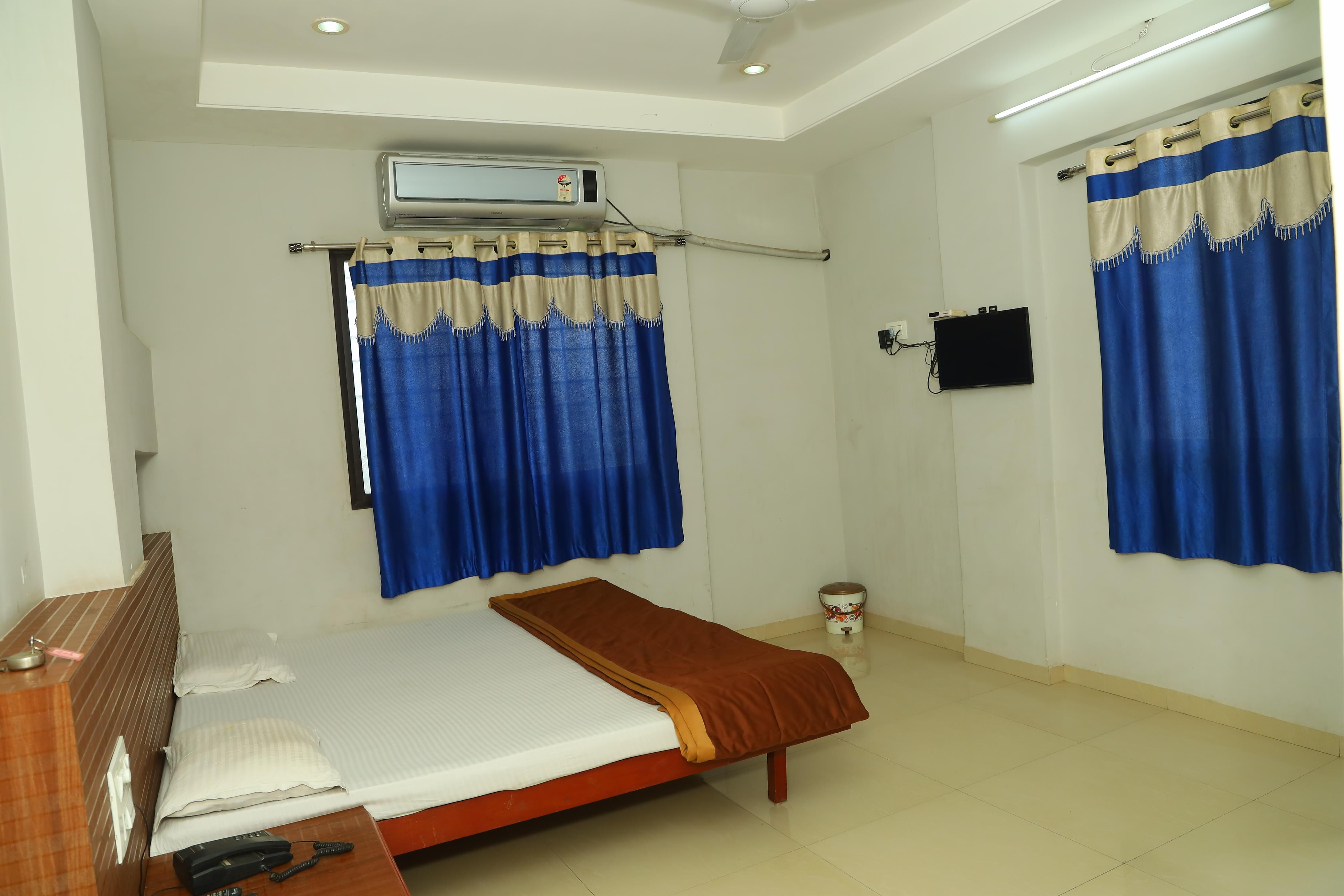 Hotel Om Residency - Tap to explore photos