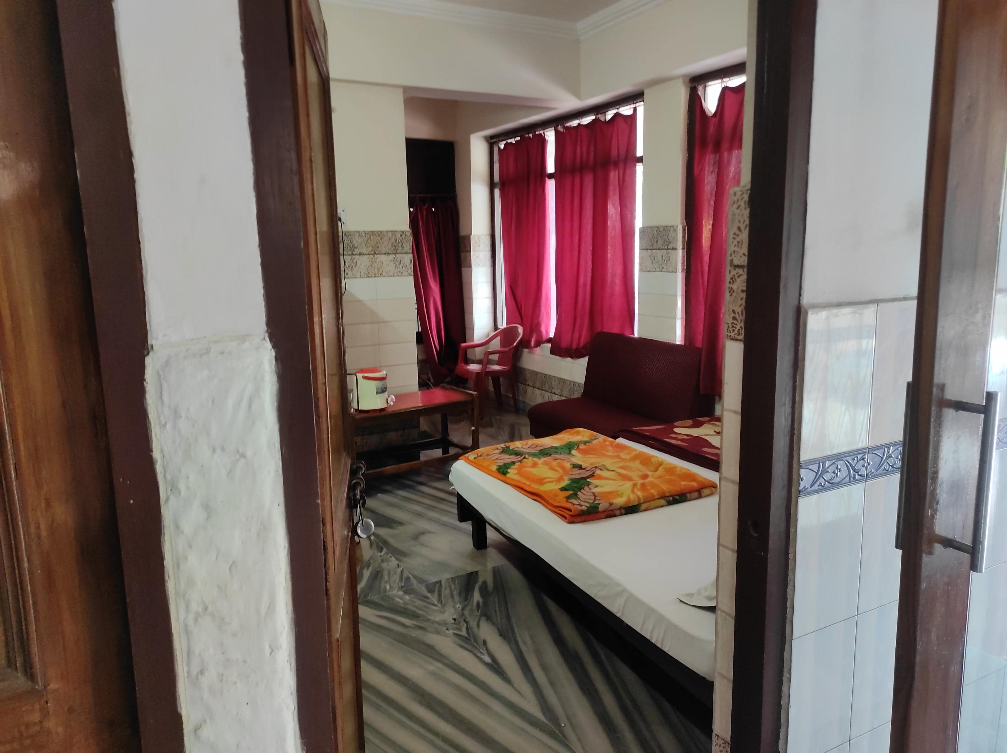 RADHA KRISHNA INN - Tap to explore photos