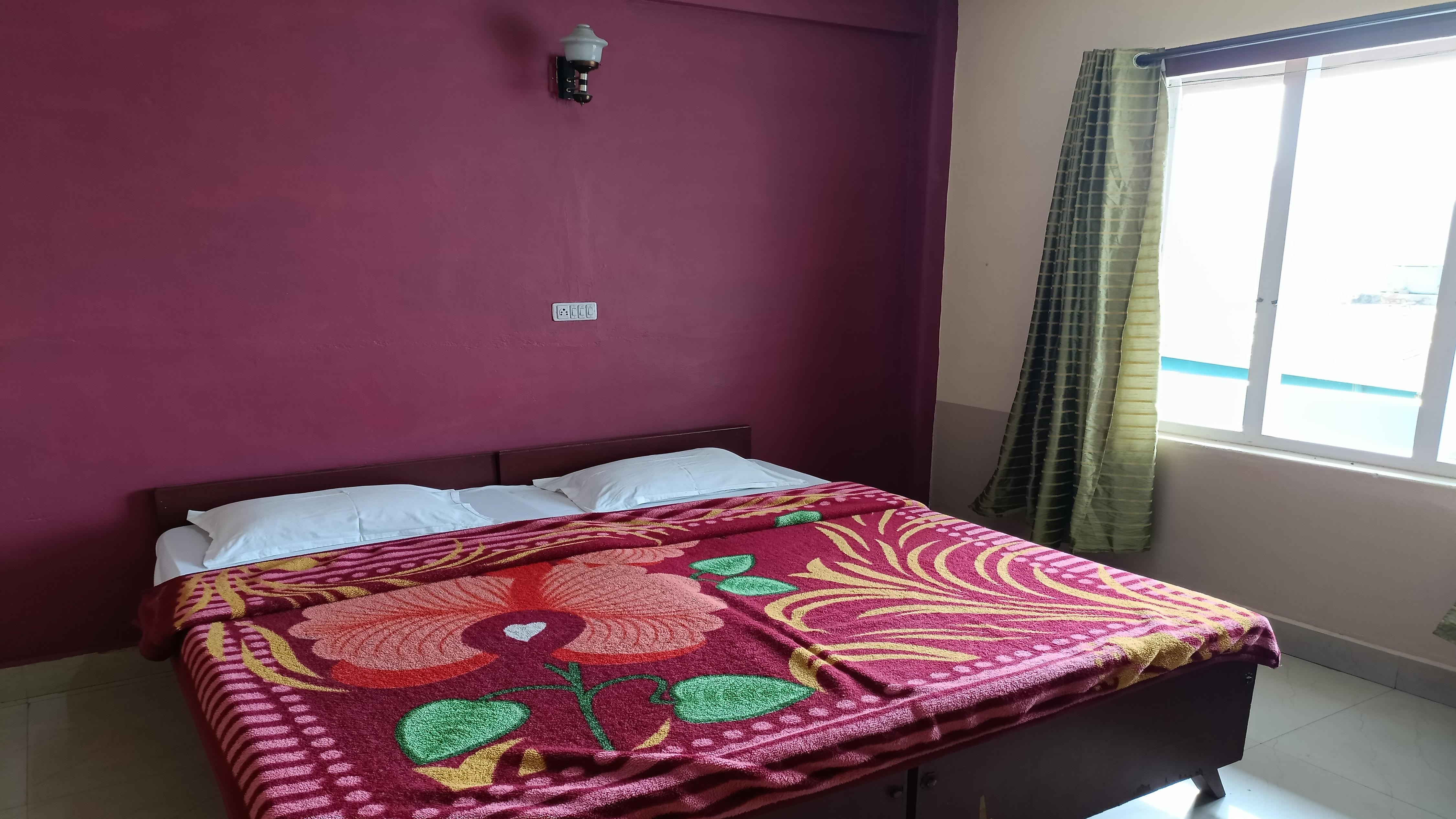 Sri Lakshmi Tourist Home - Tap to explore photos