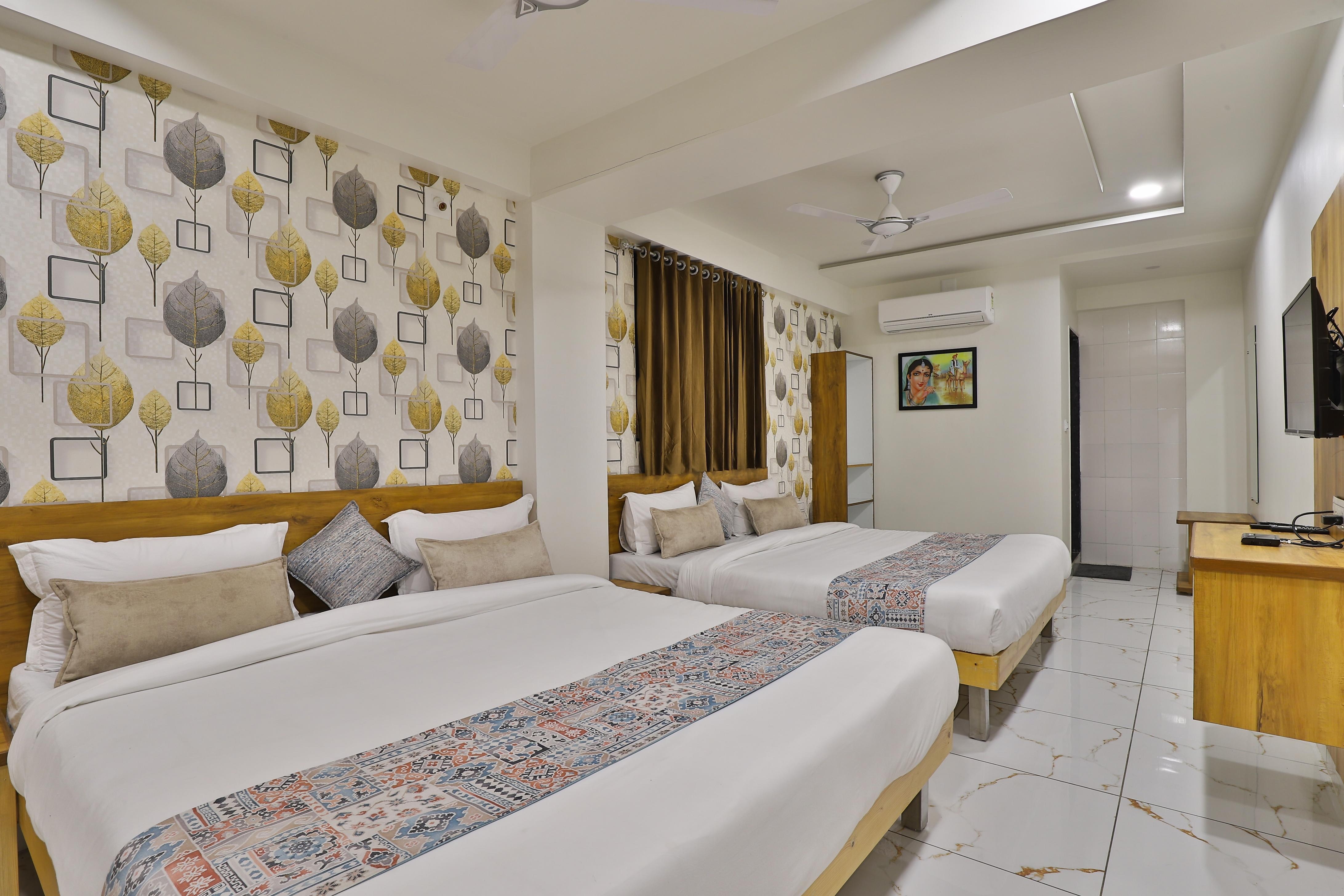 Hotel S R Rooms - Tap to explore photos