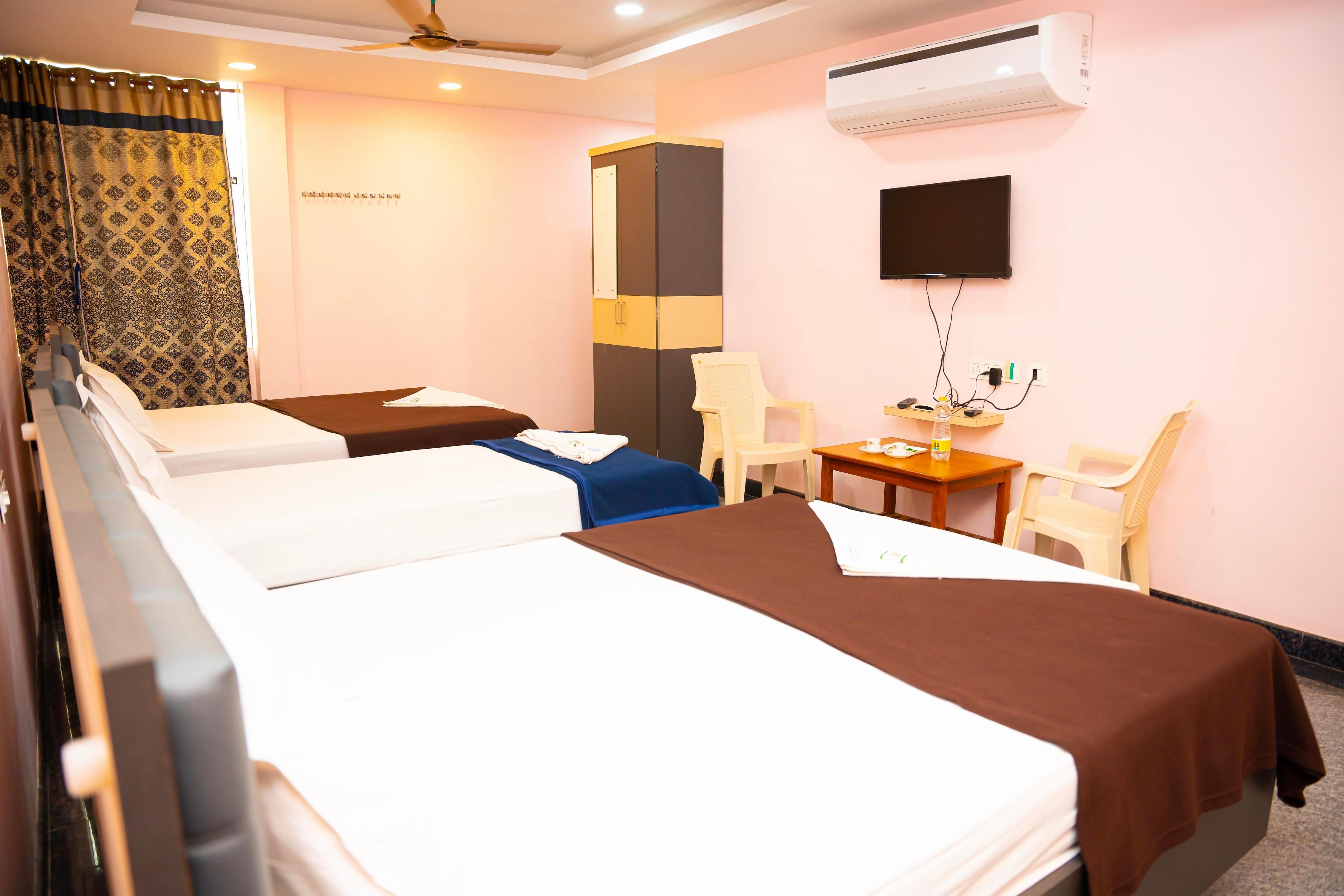 Hotel Sri Shanmuga AC - Tap to explore photos