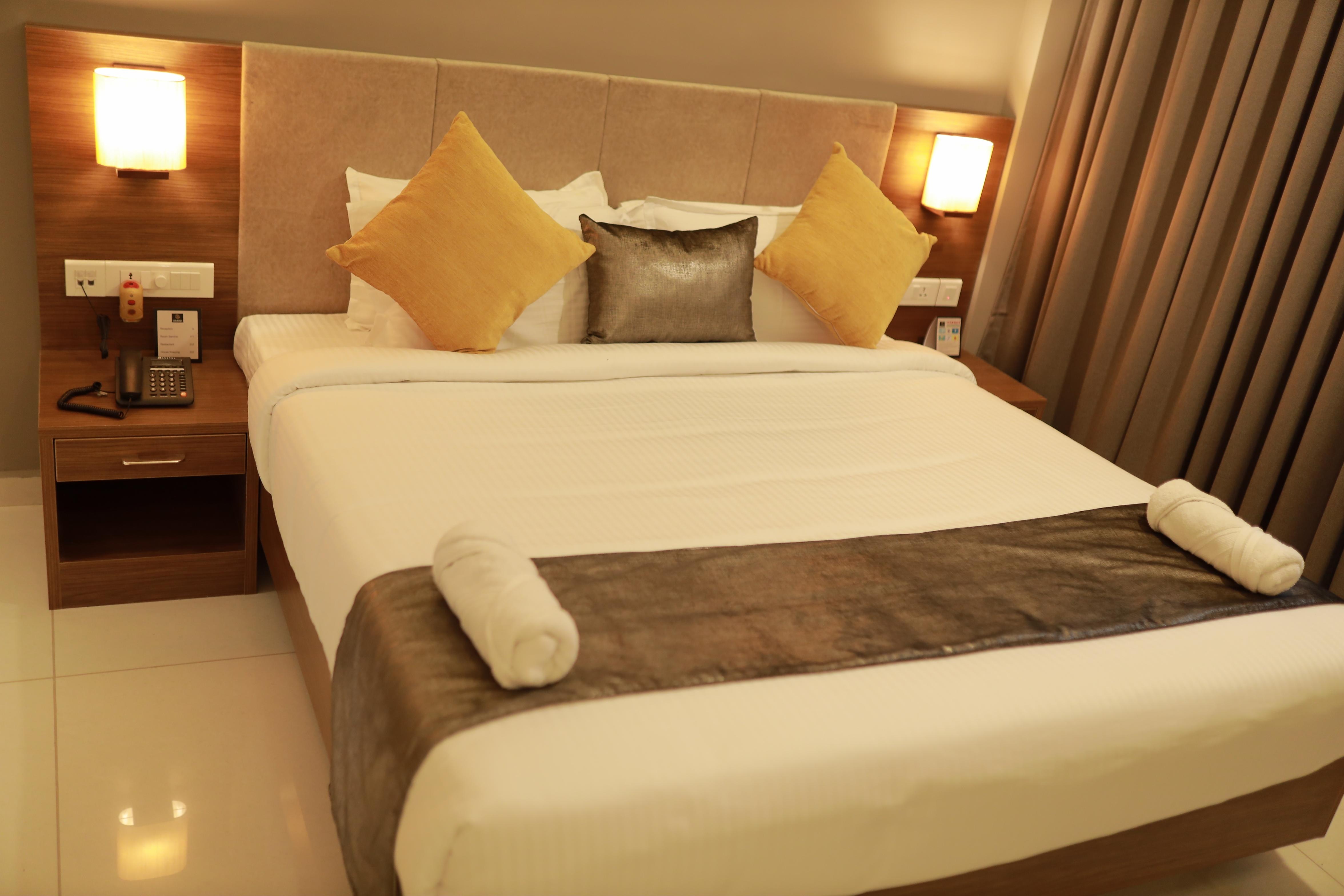 Hotel Kottayam Grand - Tap to explore photos