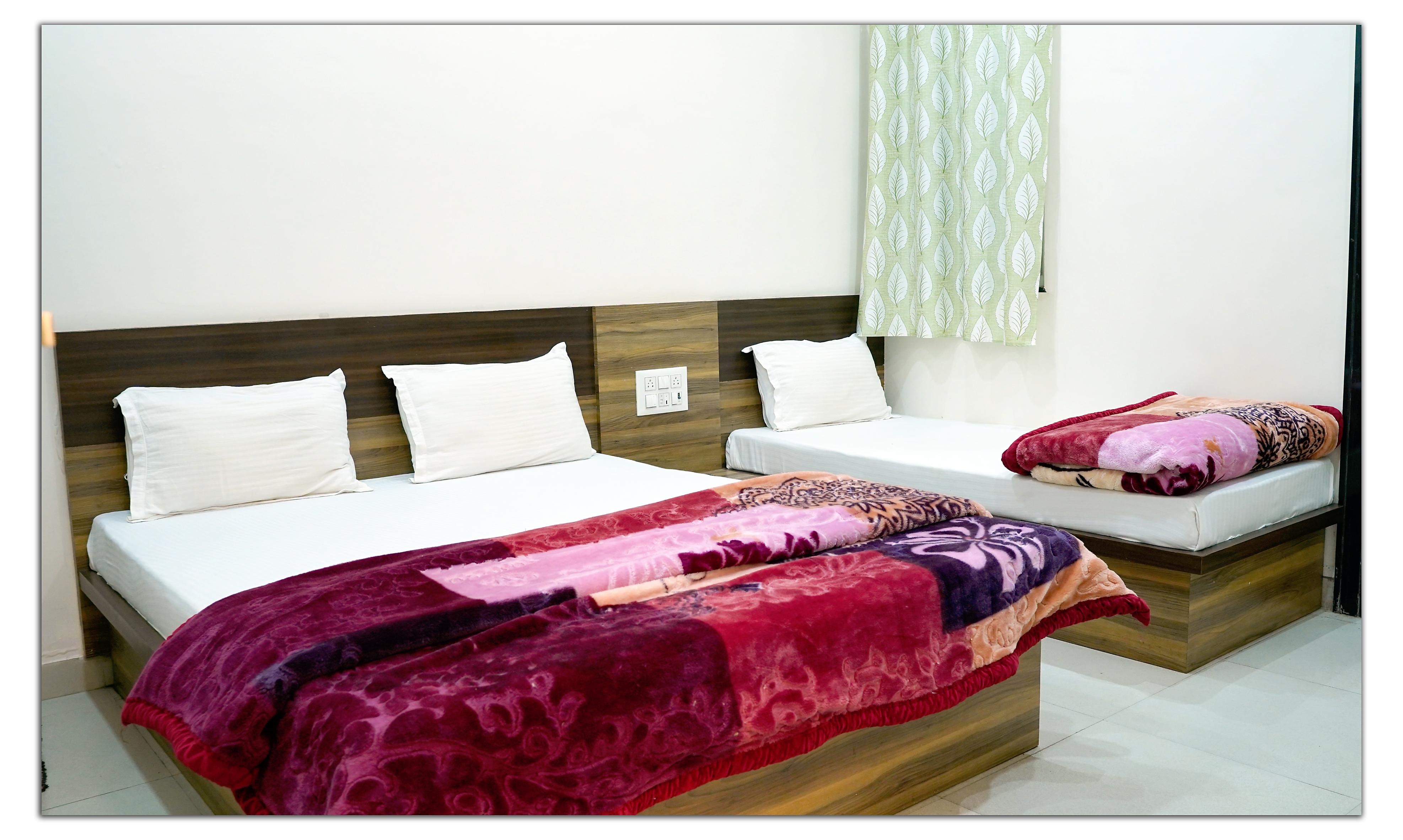 Hotel Anand - Tap to explore photos