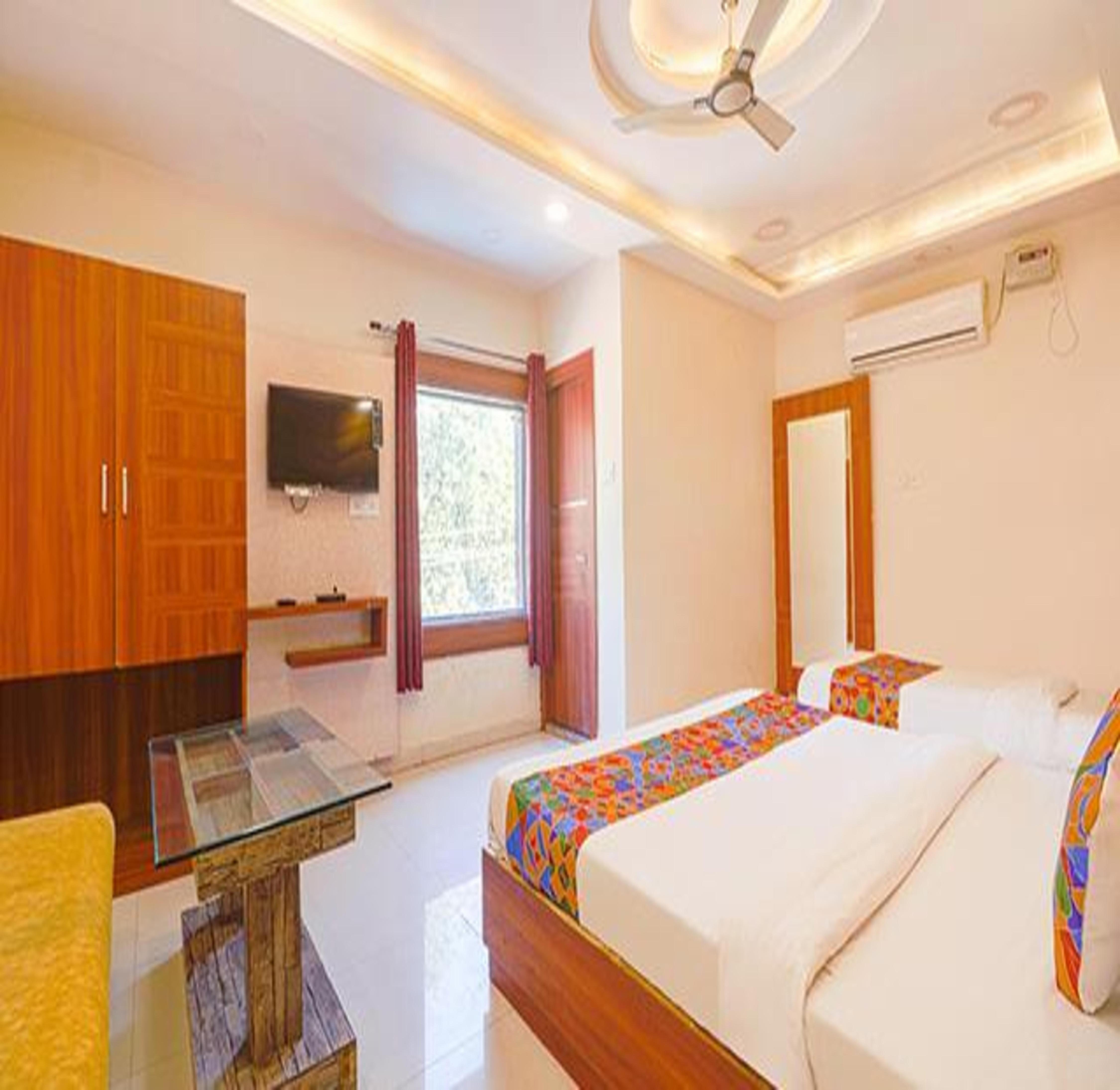 FabHotel Royal Aanandam - Tap to explore photos
