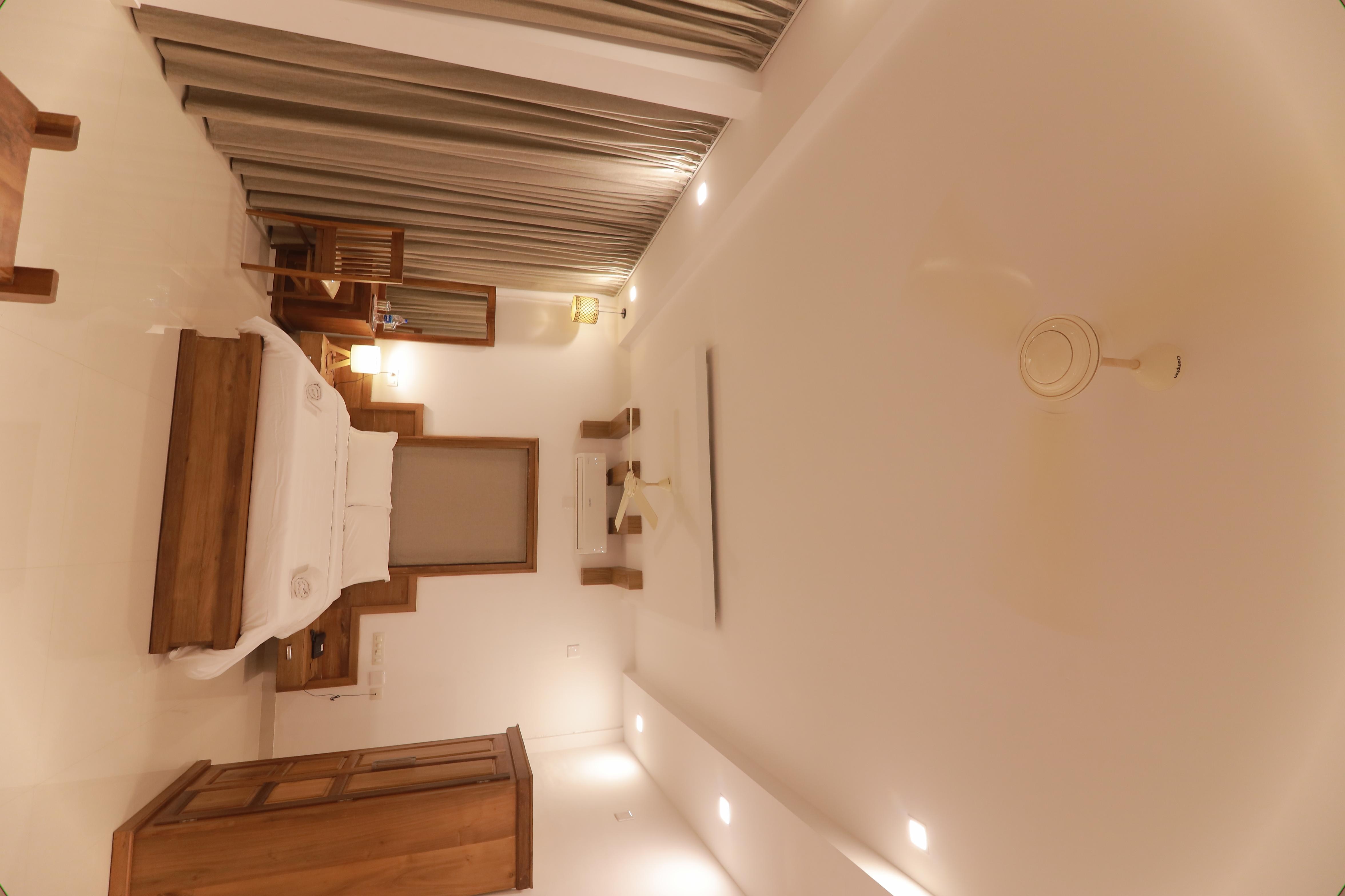 Hotel OPM INN Payyannur - Tap to explore photos