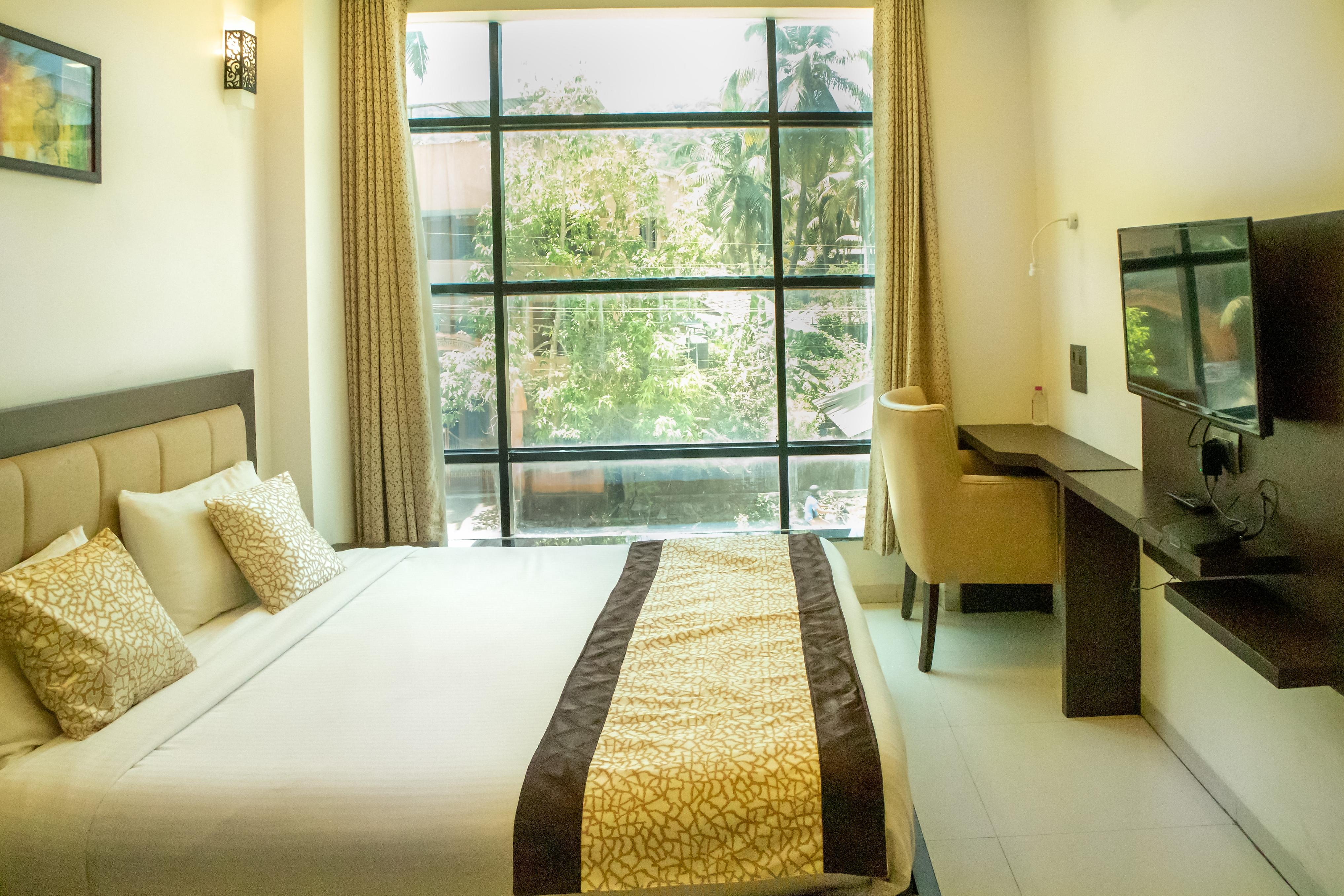 Hotel Amrut Inn - Tap to explore photos
