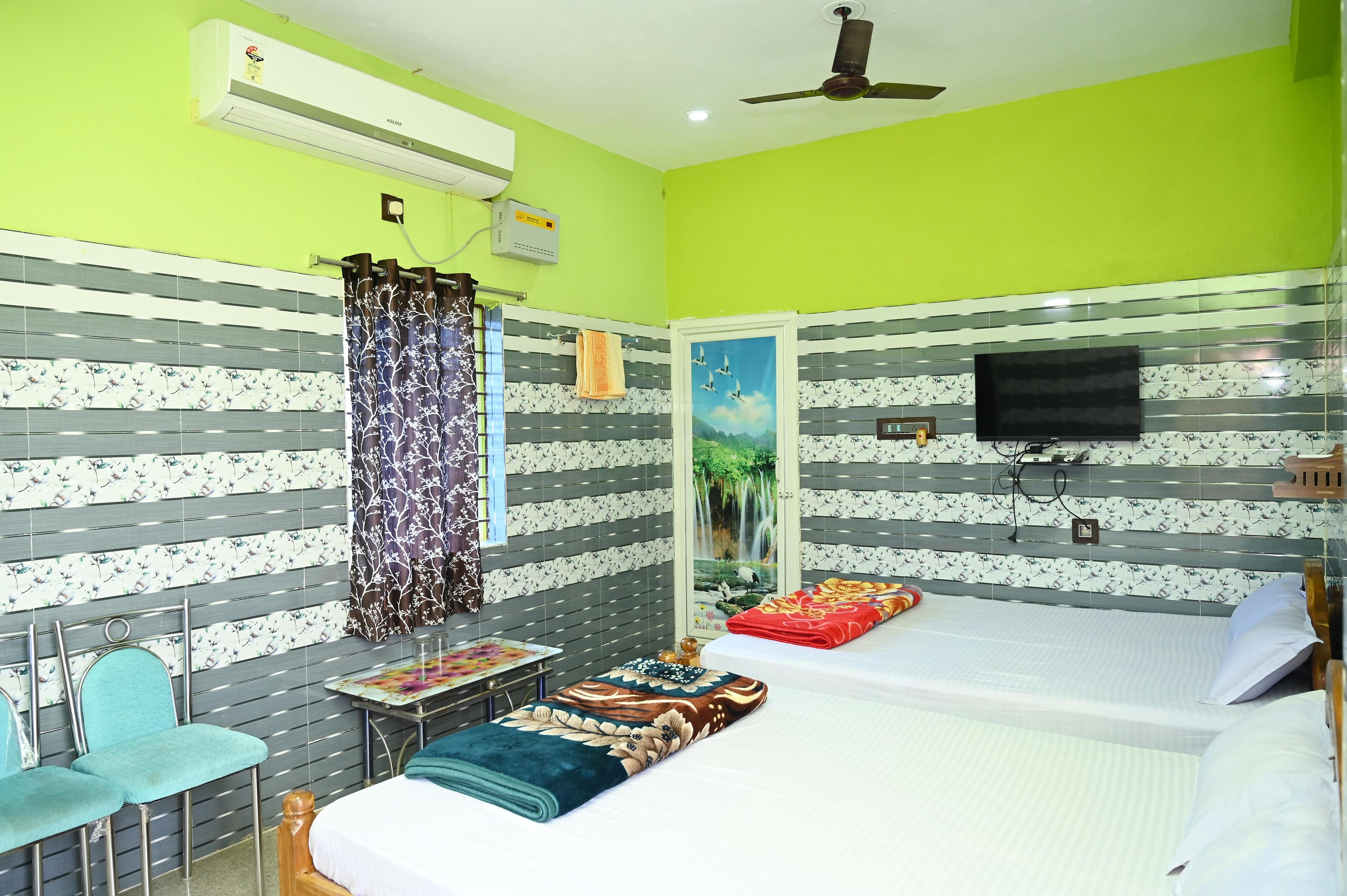 HOLIDAY INN GUEST HOUSE - Tap to explore photos