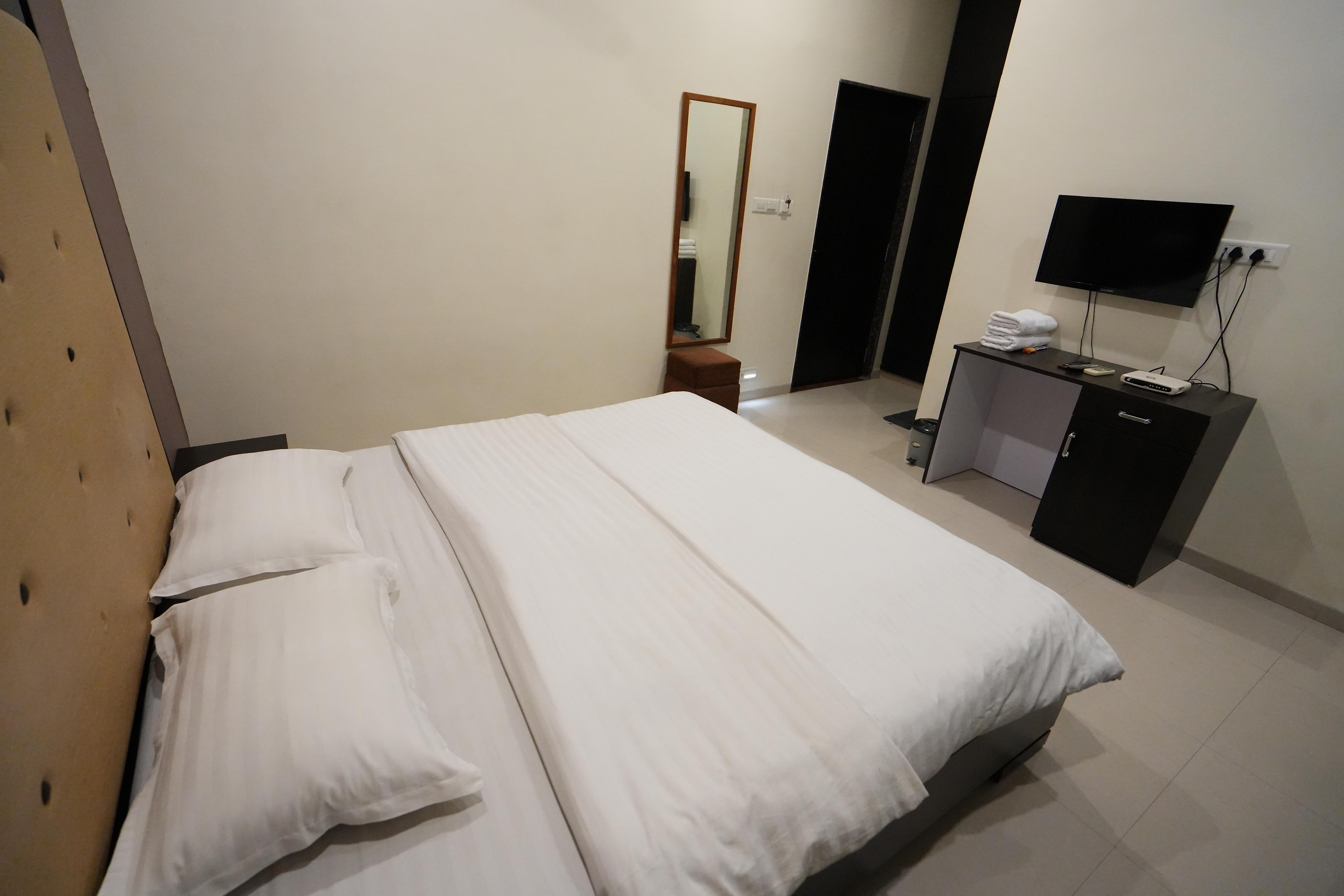 Hotel Ravi Residency - Tap to explore photos