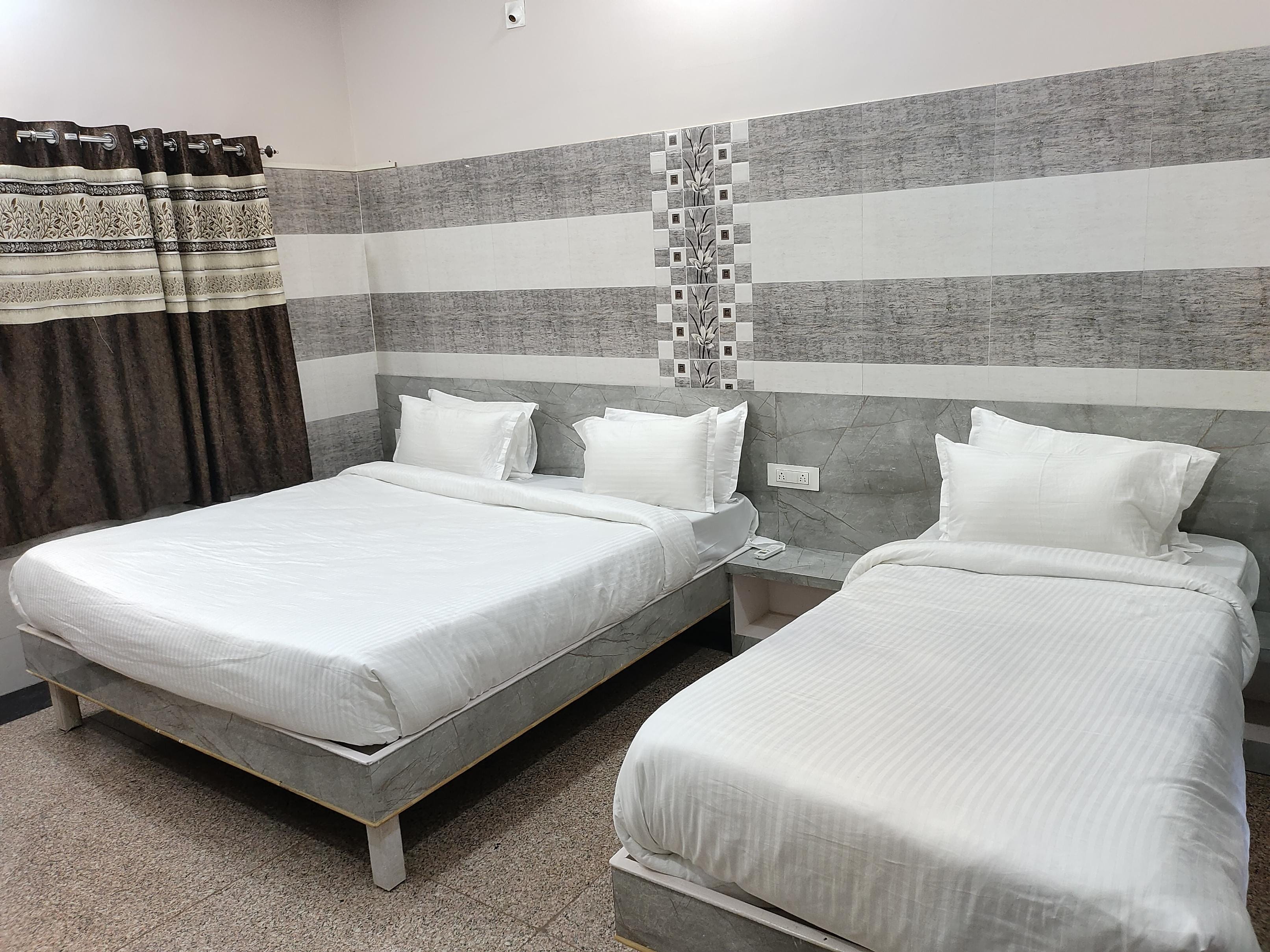 Hotel Mattu International - Tap to explore photos