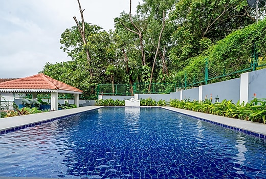 ELIVAAS Prive BluDoor 5 BHK with Pvt Pool, Entertainment Room & Glass House