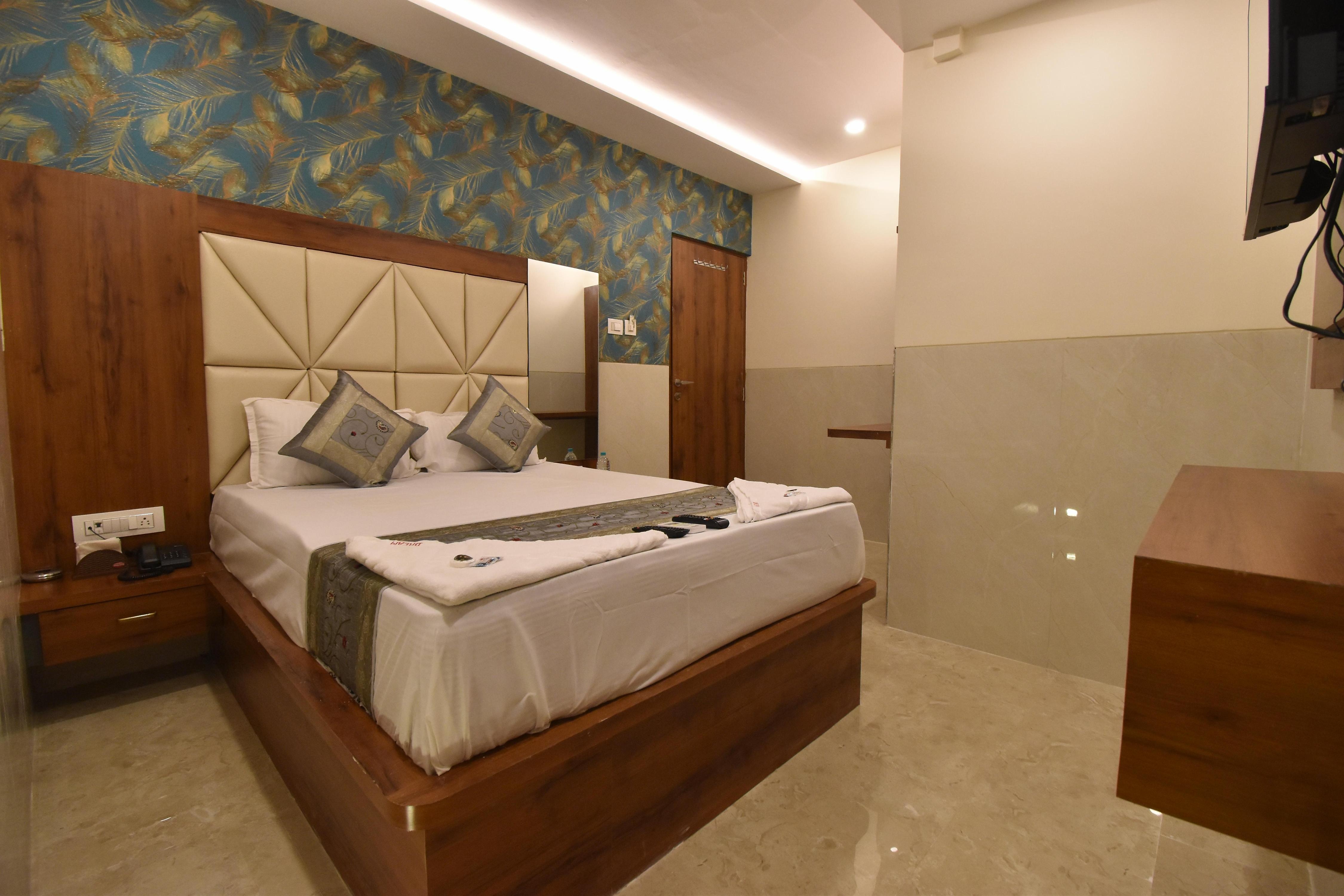 Hotel Dream Palace Residency - Tap to explore photos