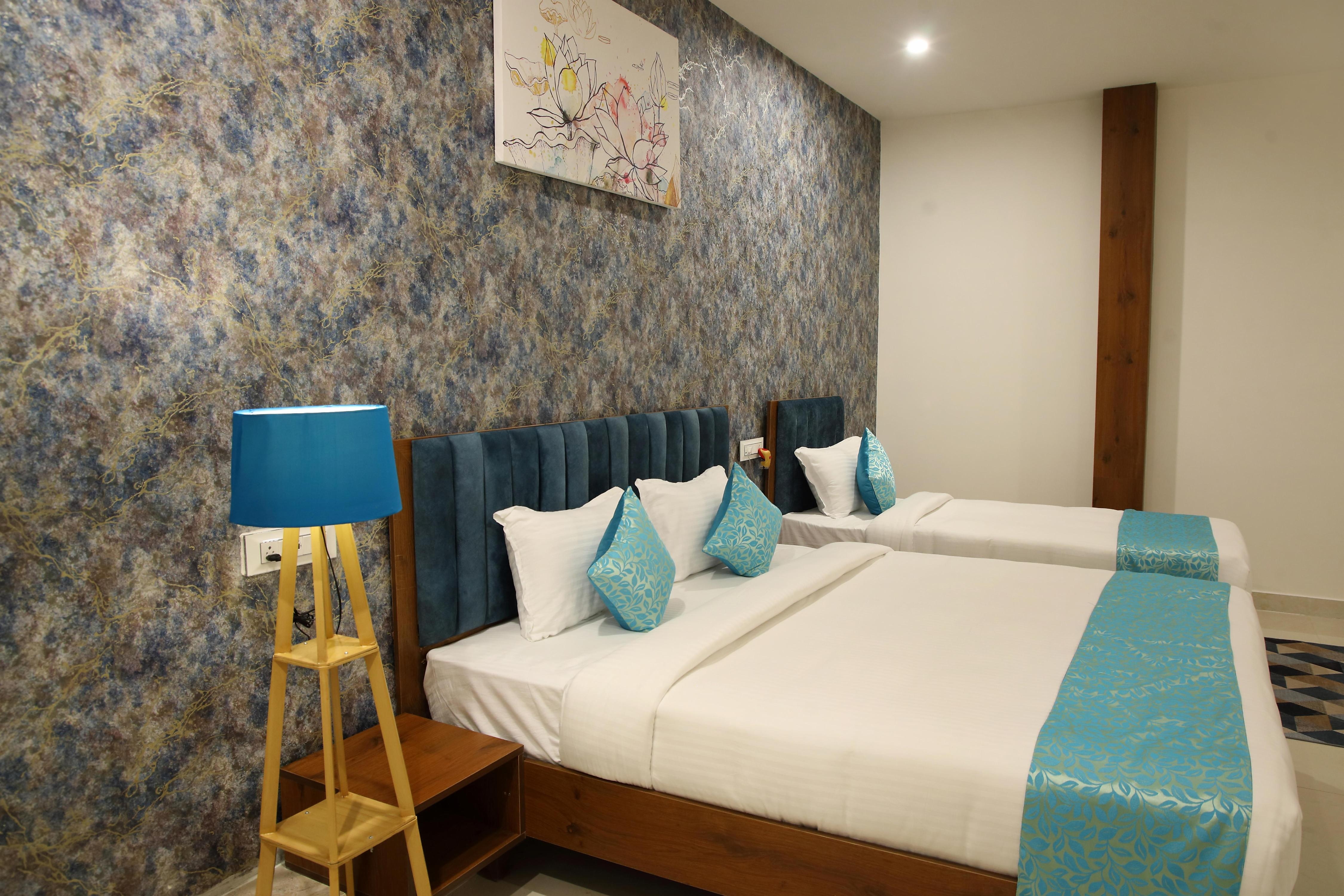 Zing Rooms by Guest house Suites - Tap to explore photos