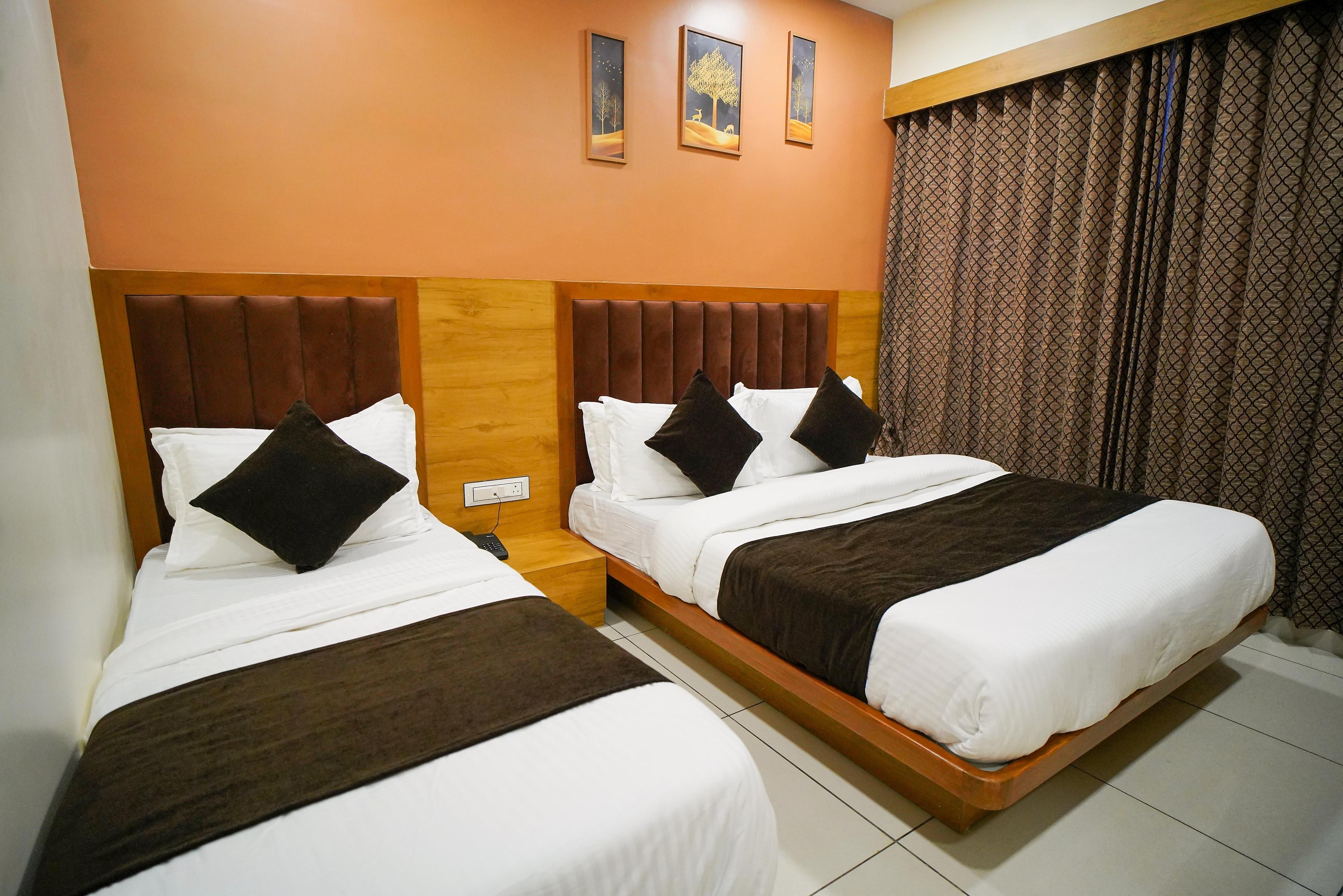 Hotel Suncity Ashram Road - Tap to explore photos
