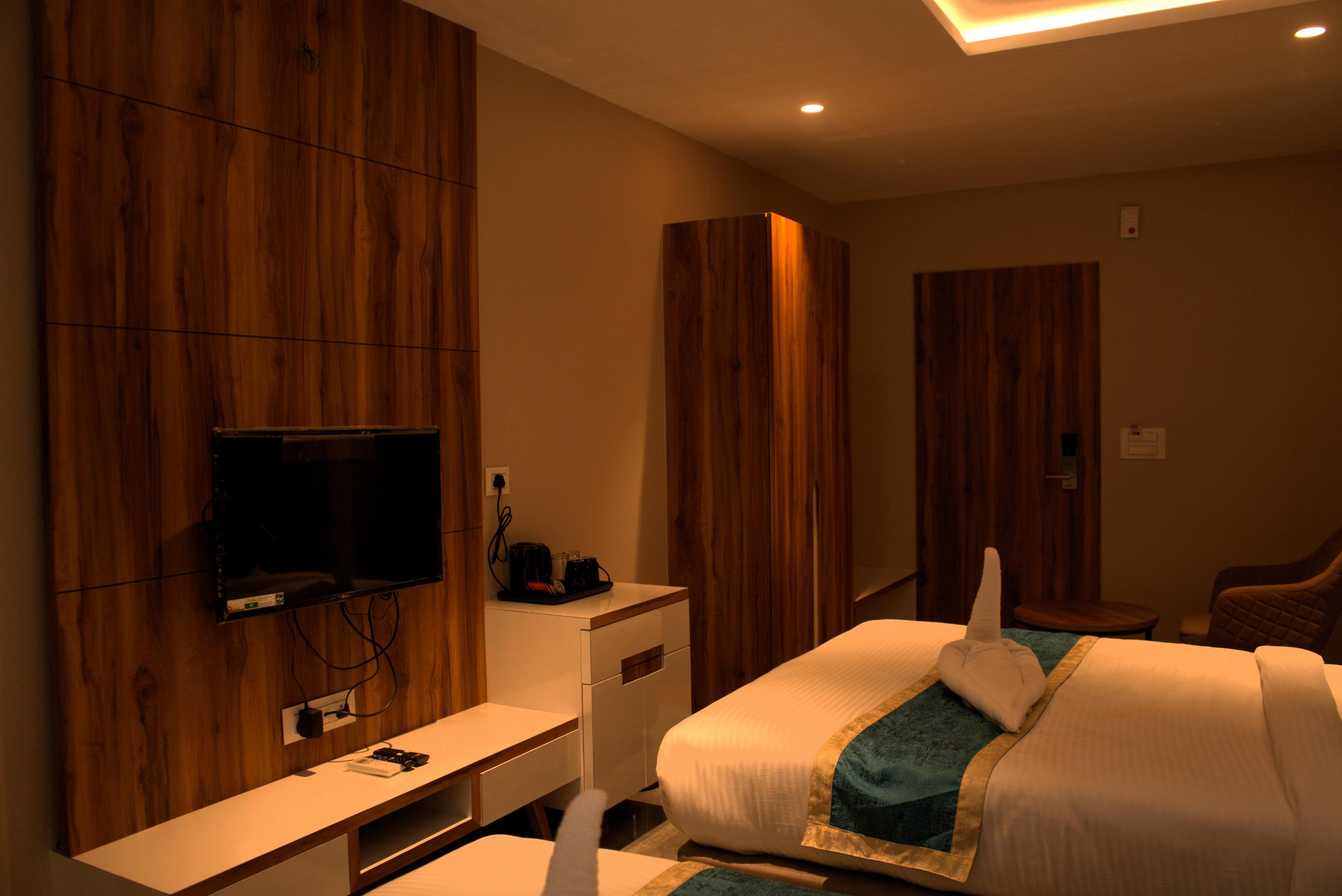Hotel Tanisha - Tap to explore photos