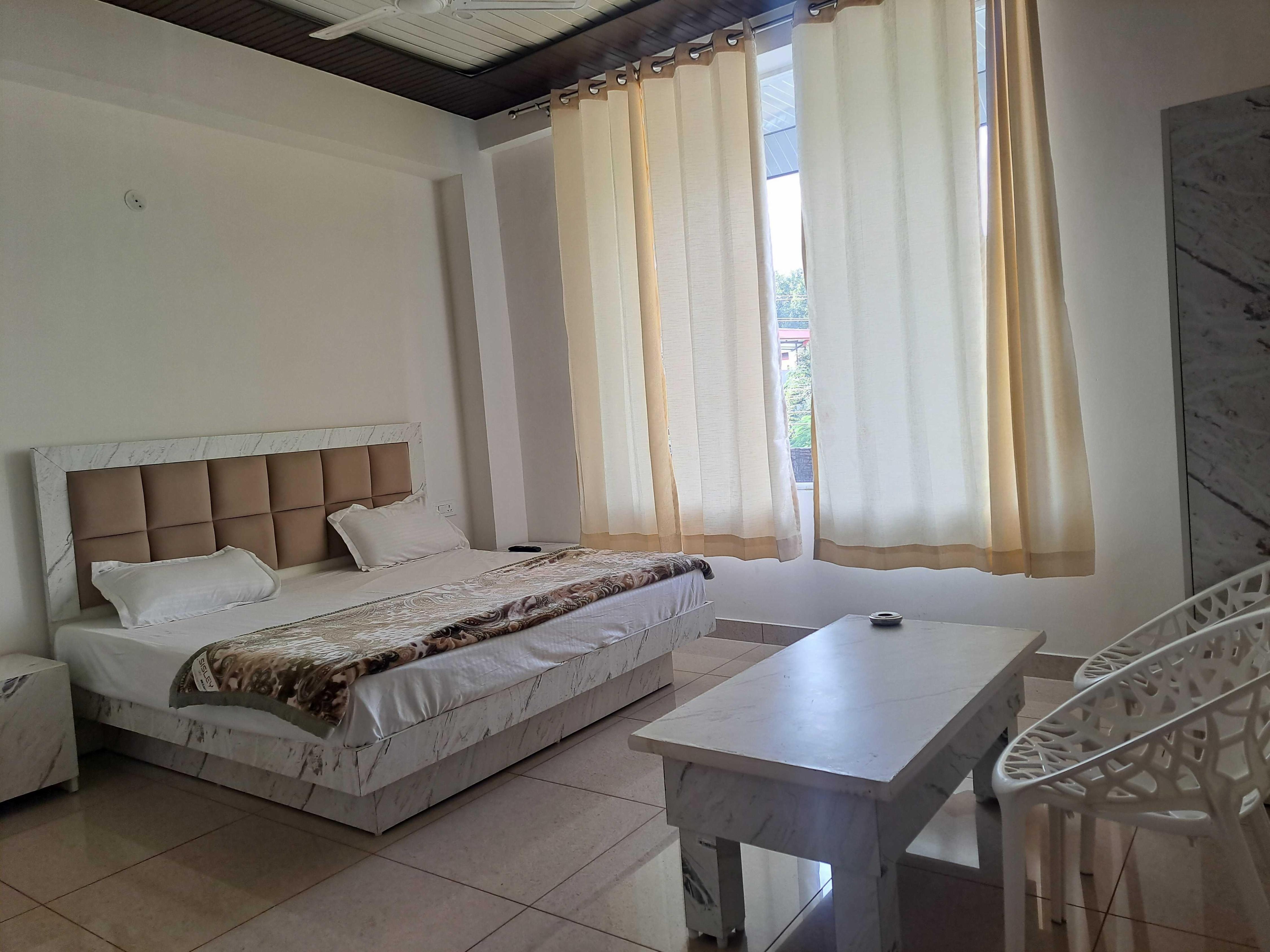 Collection O MALIK HOME STAY - Tap to explore photos