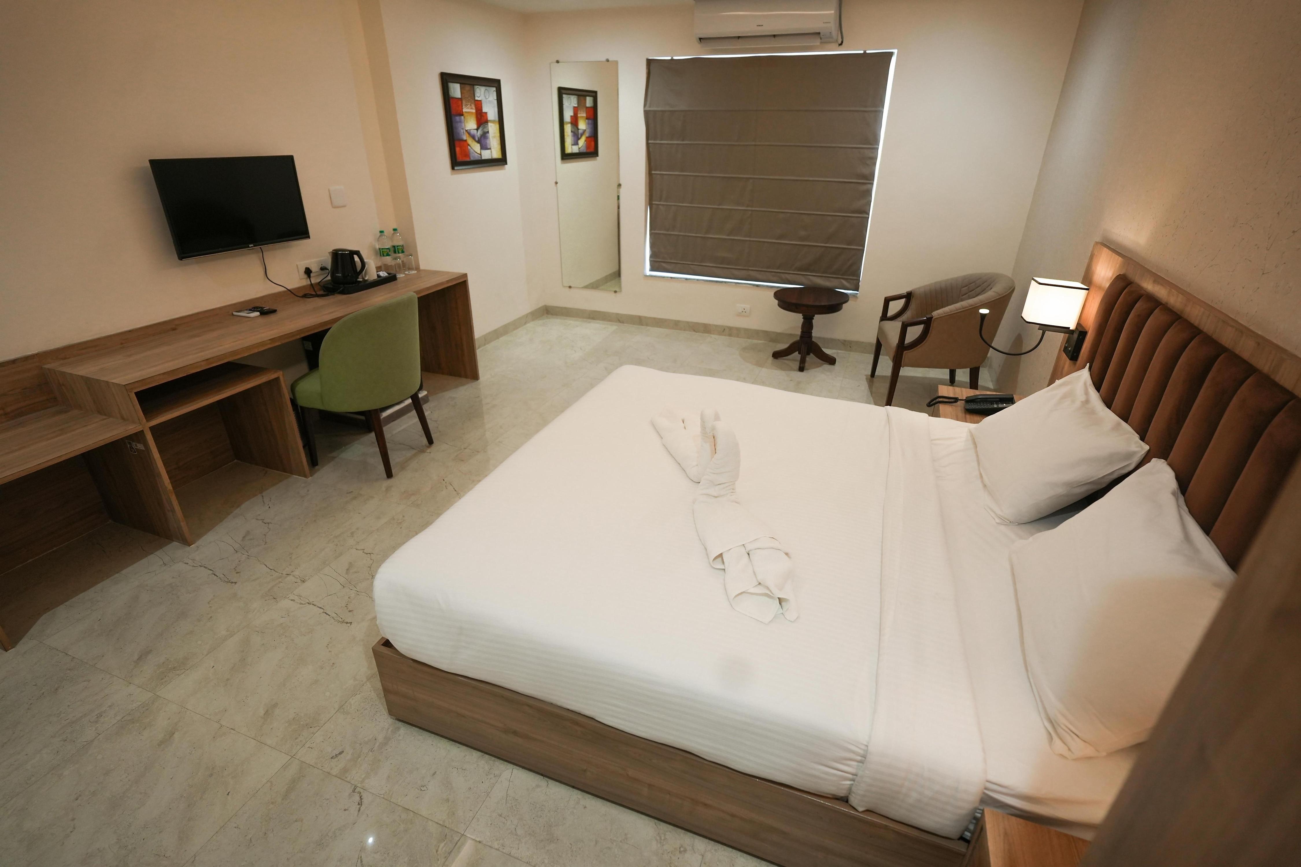 Hotel The Avoir Asansol - Tap to explore photos