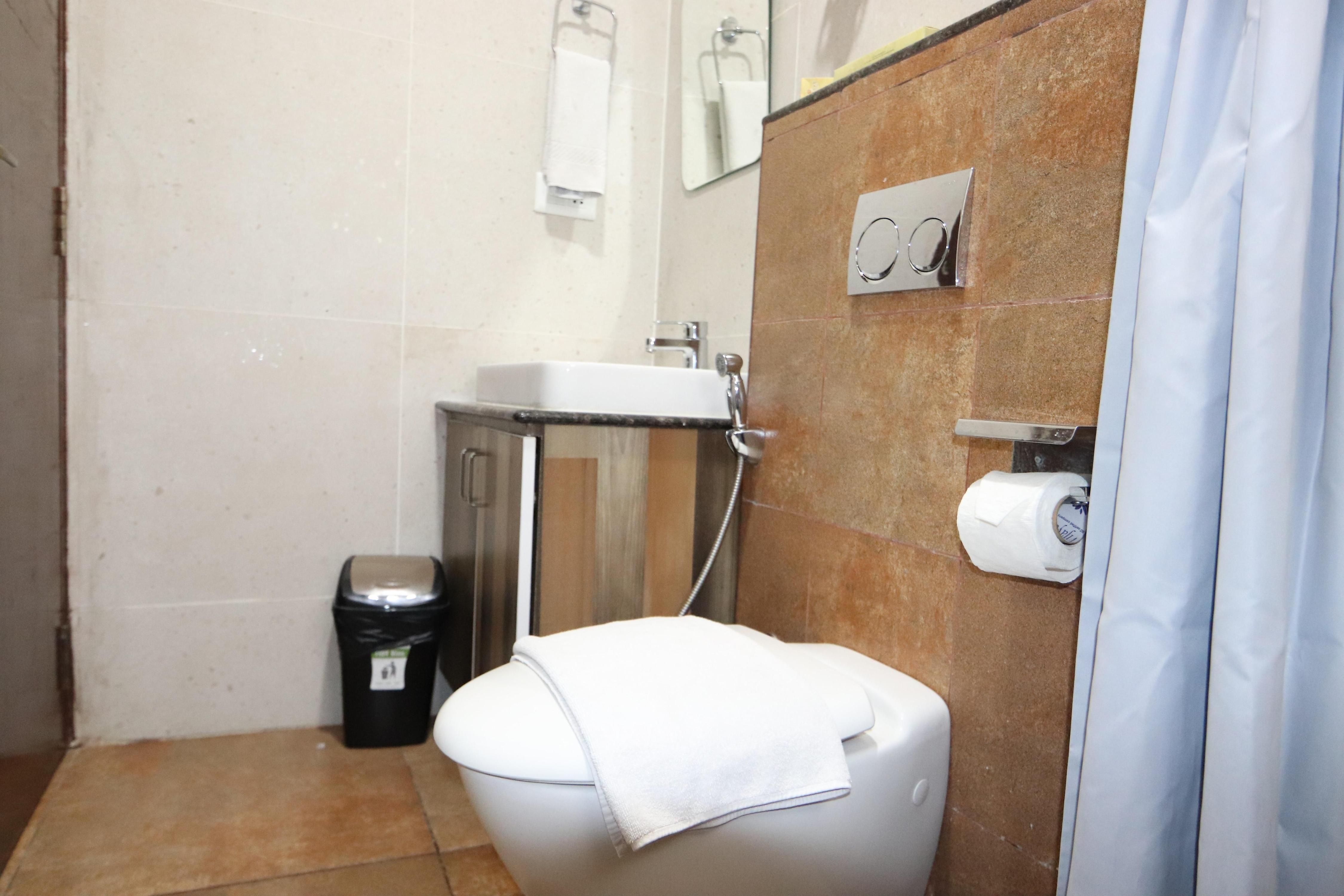 Athulya Residence  Suite Rooms - Tap to explore photos