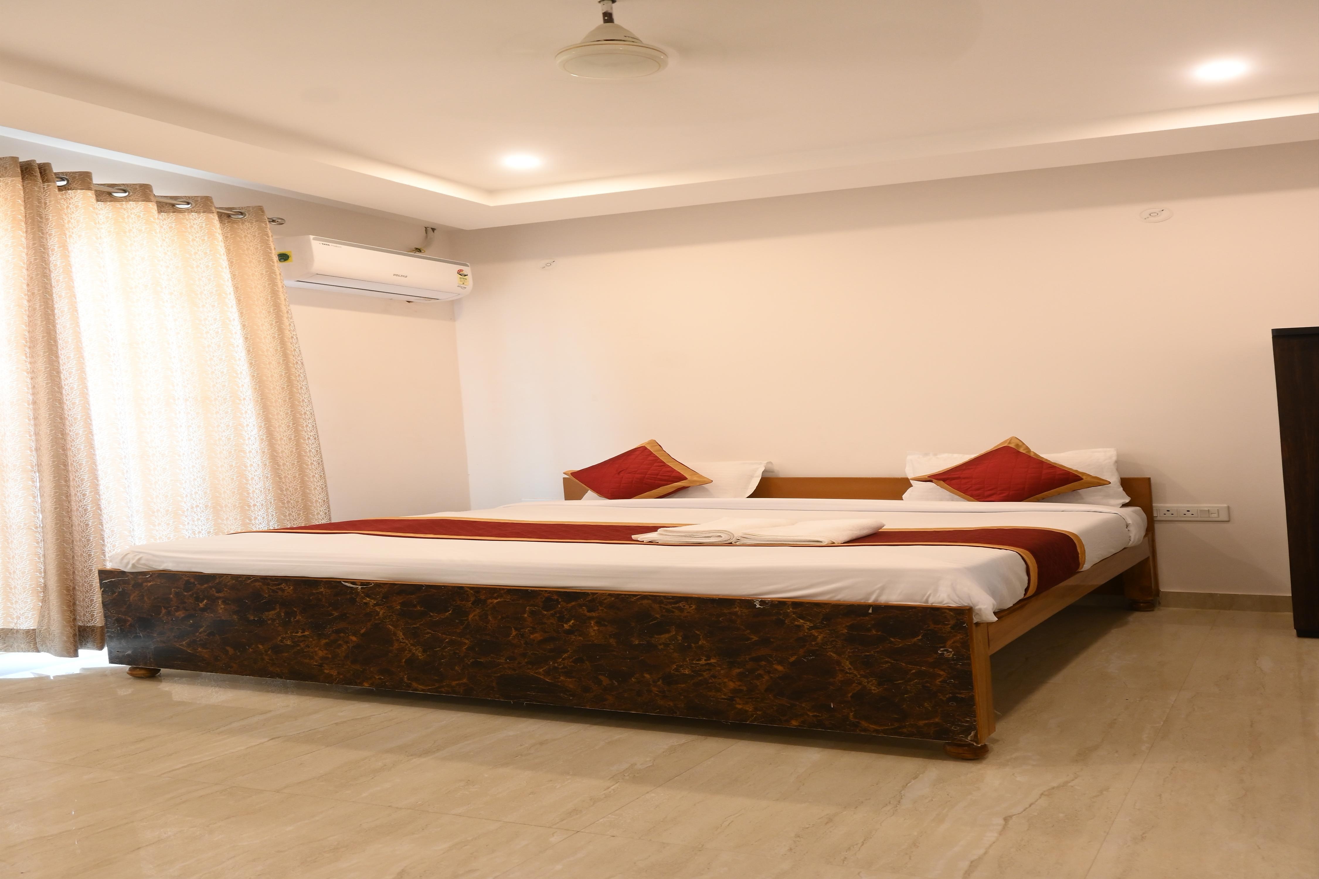 Uday Paramount Inn - Tap to explore photos