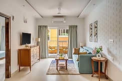 tisyastays | Evara 1BHK Apartment with Pool & Gym , Close to beach, Goa