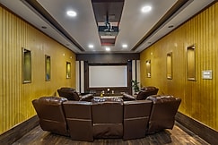 Wooden Whispers - A Luxe Traditional Spacez Villa with Private Theatre & Terrace, Bangalore