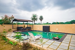Elivaas The Bliss Nestlewood | 2-BHK Villa With Private Pool, Lush Garden & Poolside Gazebo, Udaipur