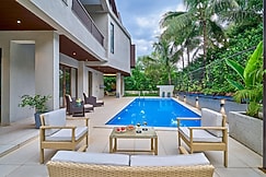 SaffronStays Sea Breeze - Luxury 4BR Pool Villa with Game Room, Terrace and Lawns near Saral Beach,, Alibaug