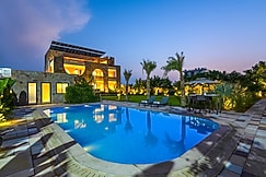 ELIVAAS Prive Chez Nandani | 5 BHK Mediterranean Style Farm House With Private Outdoor Heated Pool, Jaipur