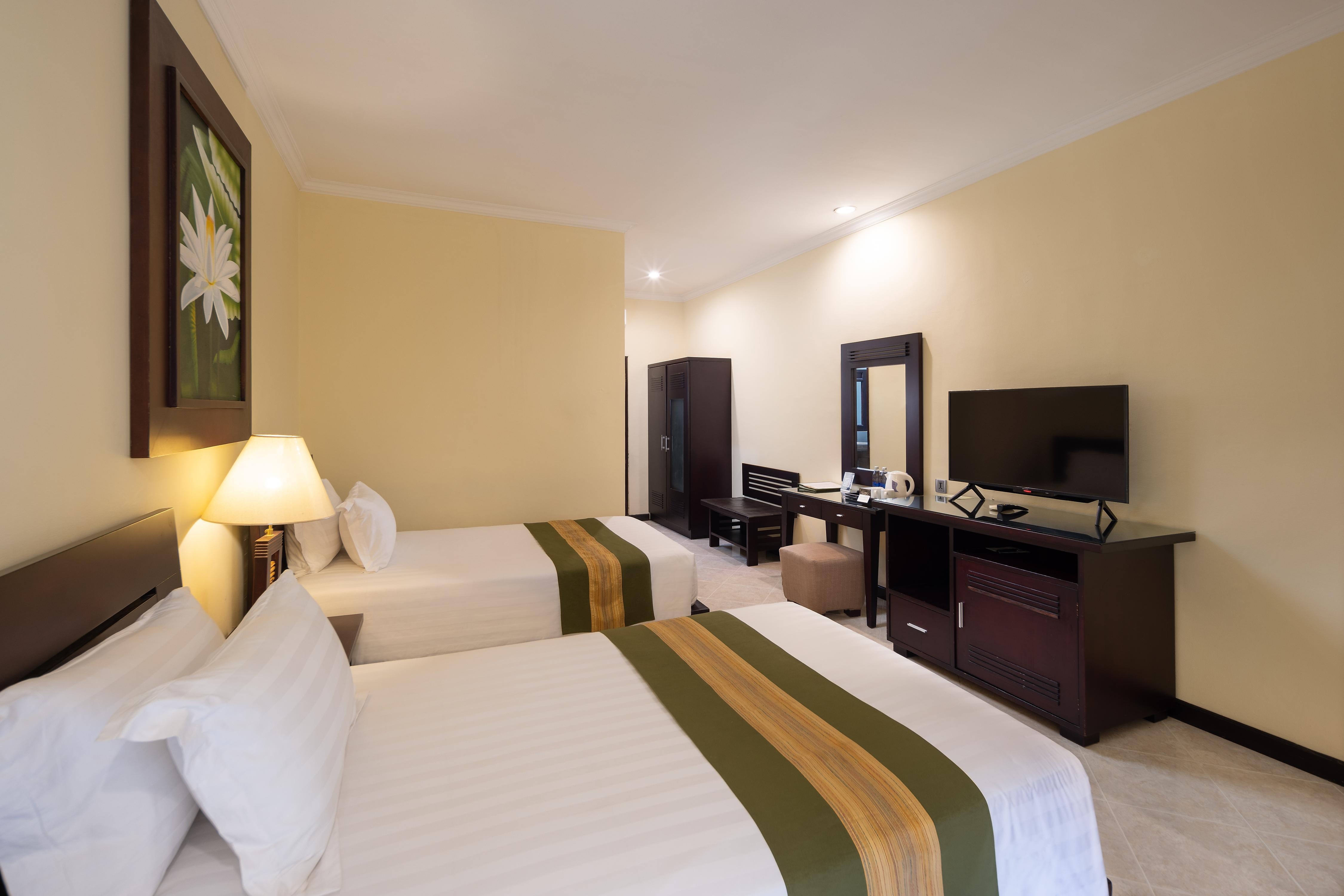 Adi Dharma Hotel Kuta - Tap to explore photos